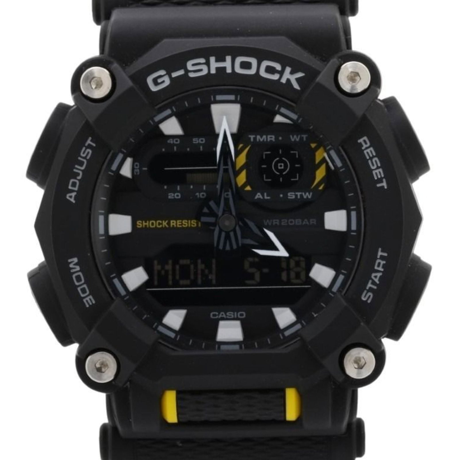 Casio Wristwatch: Casio Wristwatch The Casio G-Shock wristwatch boasts a durable plastic case and band, making it a practical choice for everyday wear. Its black dial stands out against the background, while its