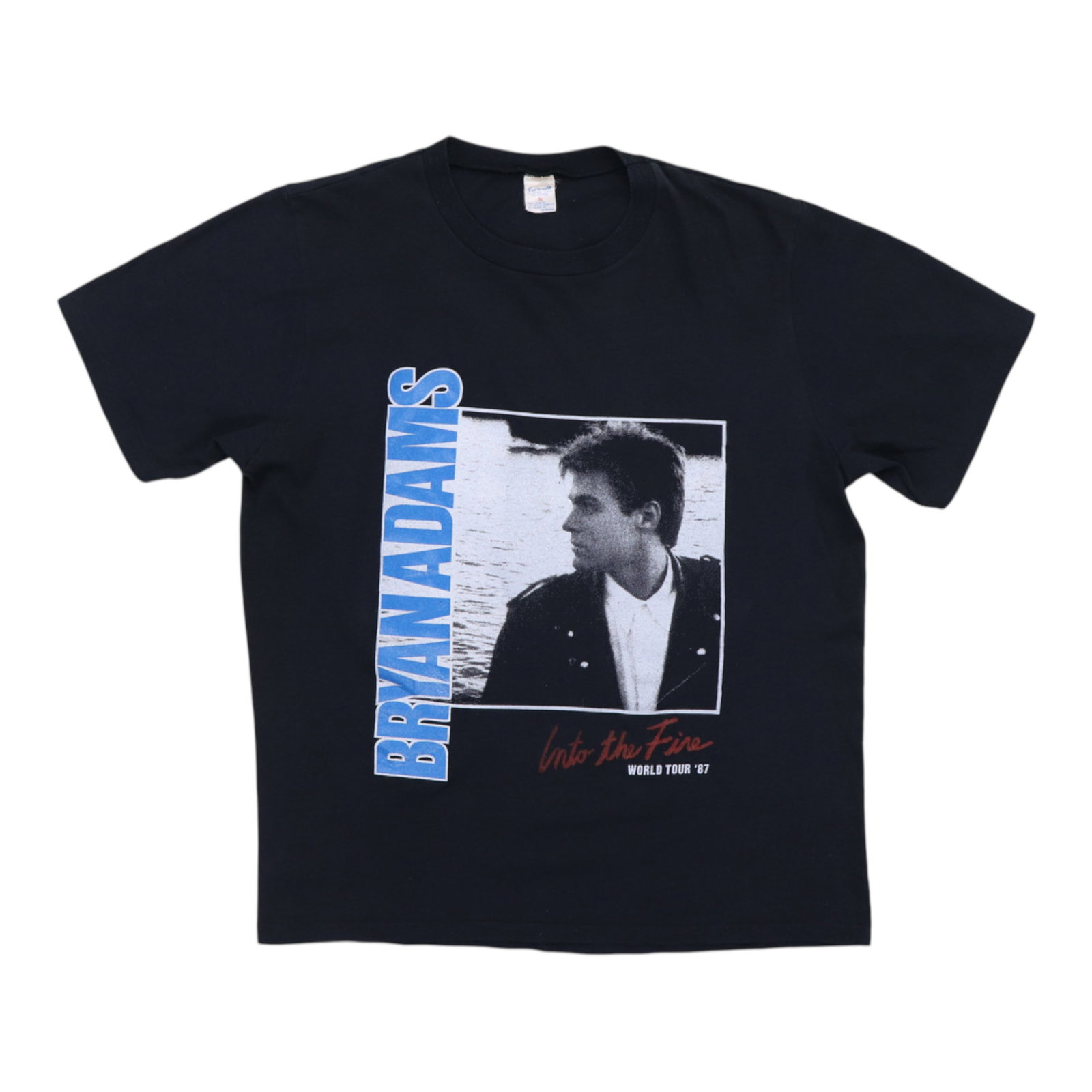 Into Fire World Tour 1987 Bryan Adams Shirt: Into Fire World Tour 1987 Bryan Adams Shirt Extra Large Extra Large Black Bryan Adams Into The Fire World Tour Shirt, featuring front and back graphics. This vintage 1987 tour shirt has a classic desi