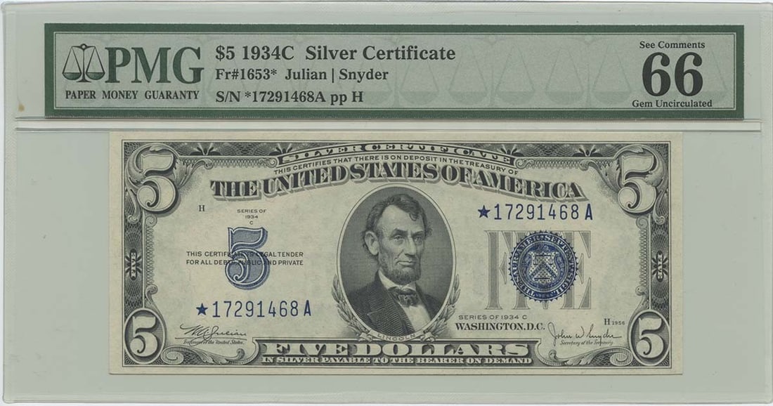 1934C $5 Silver Cert FR#1653* PMG 66 Gem UNC EPQ: 1934C $5 Silver Cert FR#1653* PMG 66 Gem UNC EPQ The 1934C $5 Silver Certificate, graded MS66 by PMG, boasts exceptional condition with minimal wear. This uncirculated note features the iconic design 