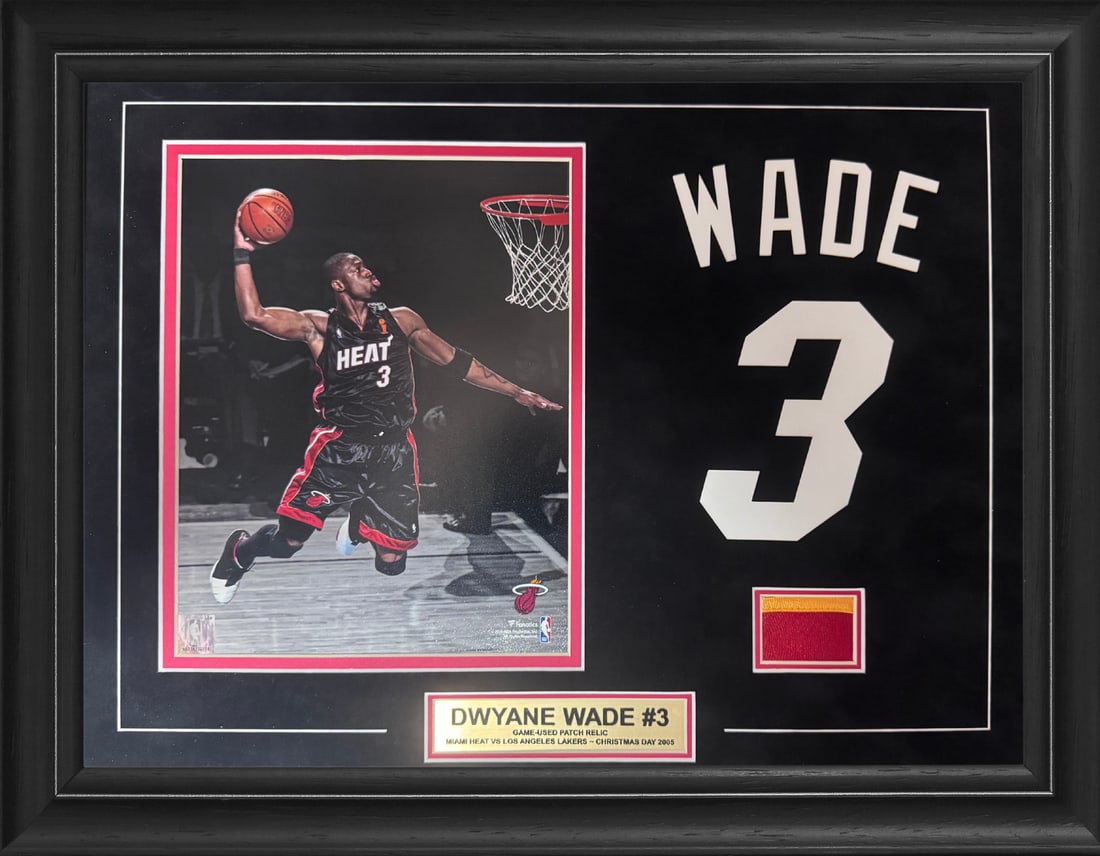 Dwyane Wade Game Used Jersey Piece w/ 8x10 unsigned Photo Framed: Dwyane Wade Game Used Jersey Piece w/ 8x10 unsigned Photo Framed Game-used jersey piece from Dwyane Wade's '06 Championship season, certified by the Miami Heat. This unique piece is framed with an 8x1