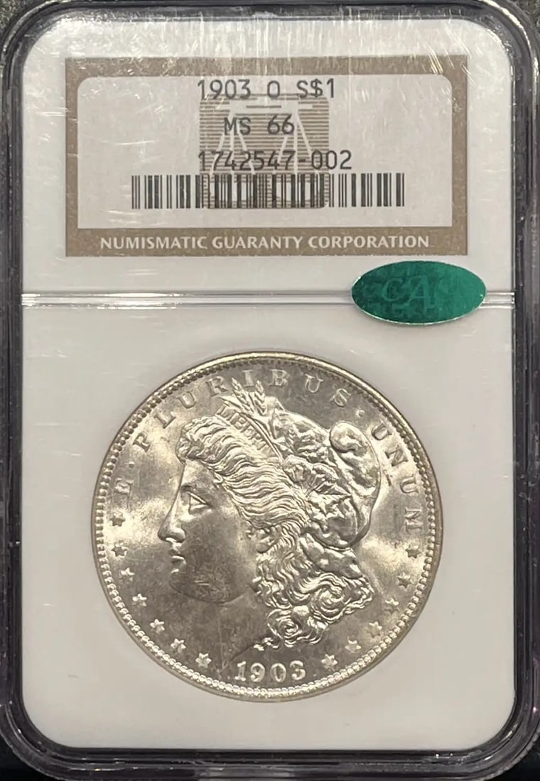 MORGAN DOLLAR 1903 O NGC MS66 CAC: MORGAN DOLLAR 1903 O NGC MS66 CAC The Morgan Dollar 1903, graded MS66 by the NGC and CAC, showcases exceptional silver quality from one of America's most iconic coin designs. This uncirculated specime