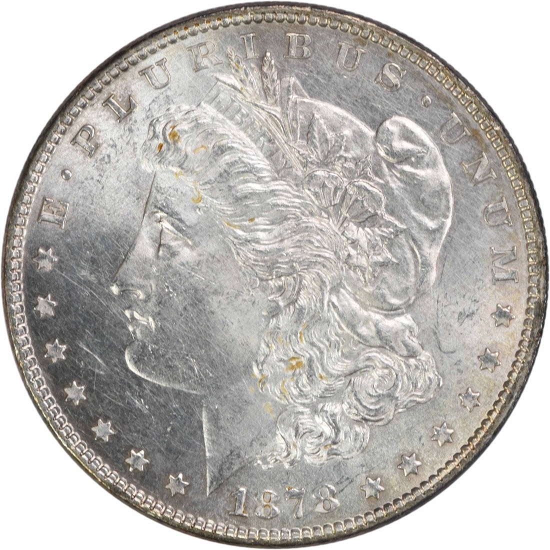 1878 Morgan Silver Dollar 7TF Reverse of 1878 BU Uncertified: 1878 Morgan Silver Dollar 7TF Reverse of 1878 BU Uncertified The 1878 Morgan Silver Dollar features a distinctive reverse design, characteristic of the series. This Uncertified BU coin showcases its s