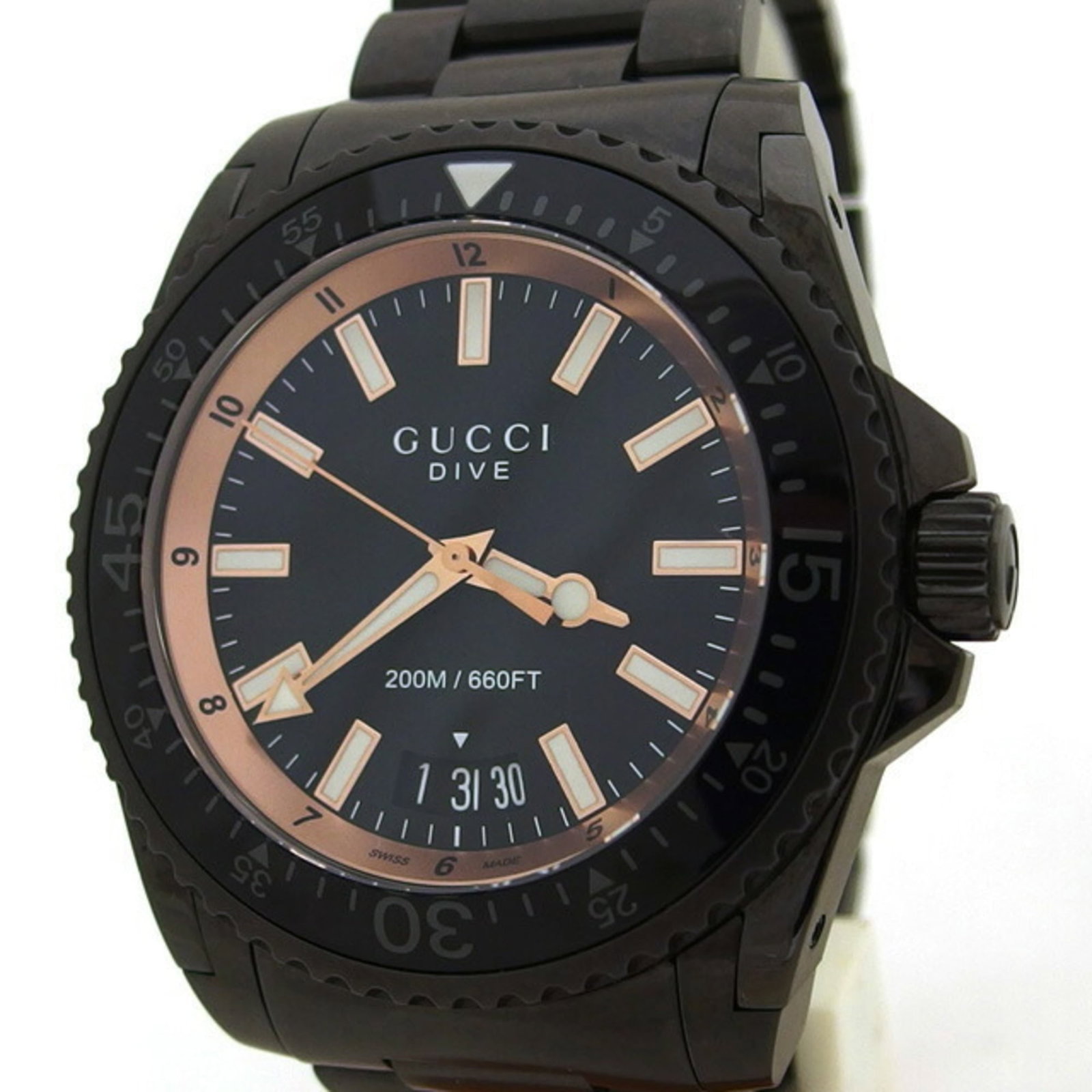 Gucci Wristwatch: Gucci Wristwatch Stainless steel case and band, the Gucci dive watch boasts a sleek black finish. With its quartz movement and analog display, this timepiece keeps perfect time. The watch comes in its