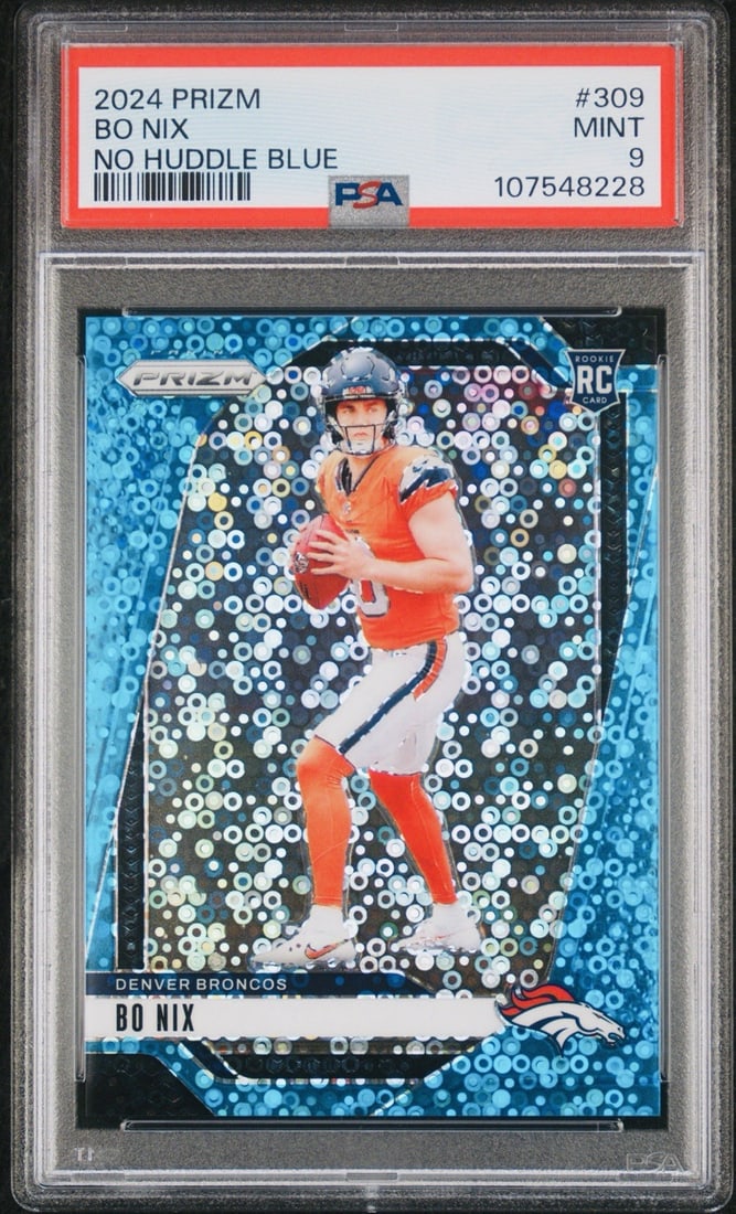 Panini Prizm Bo Nix RC 99 Broncos PSA Blue 309 Huddle: Panini Prizm Bo Nix RC 99 Broncos PSA Blue 309 Huddle Bo Nix RC 99 Broncos PSA Blue 309 Huddle, graded 9 by Professional Sports Authenticator (PSA) and certified as a 2024 Panini Prizm Parallel. This 