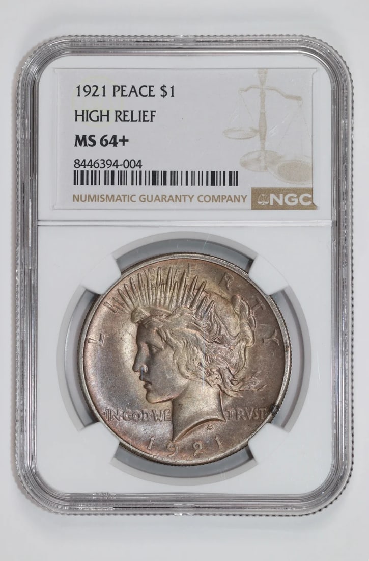 HIGH RELIEF PEACE DOLLAR 1921 ORIGINAL PQ NGC MS64: HIGH RELIEF PEACE DOLLAR 1921 ORIGINAL PQ NGC MS64 The 1921 High Relief Peace Dollar, graded MS64 by the NGC, boasts an impressive level of detail and craftsmanship. This original coin features a stri