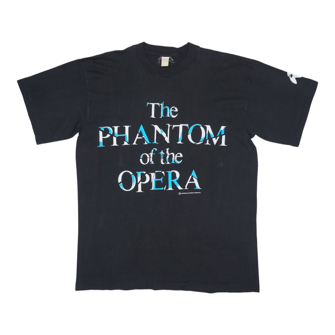 1980s Phantom Of The Opera Shirt: 1980s Phantom Of The Opera Shirt Extra Large Vintage Phantom Of The Opera Shirt. This 1980s original features black color, 50/50 poly/cotton material, and a classic design with no back graphics.