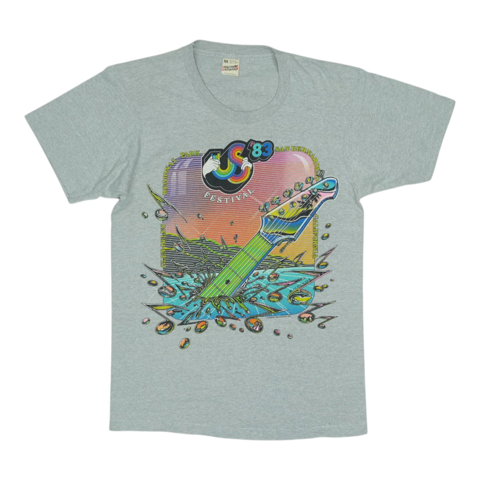 Concert Shirt Festival Us 1983: Concert Shirt Festival Us 1983 Grey US Festival Concert Shirt from 1983. This vintage shirt features front and back graphics, with a medium fit and excellent condition. Arriving washed and ready to we