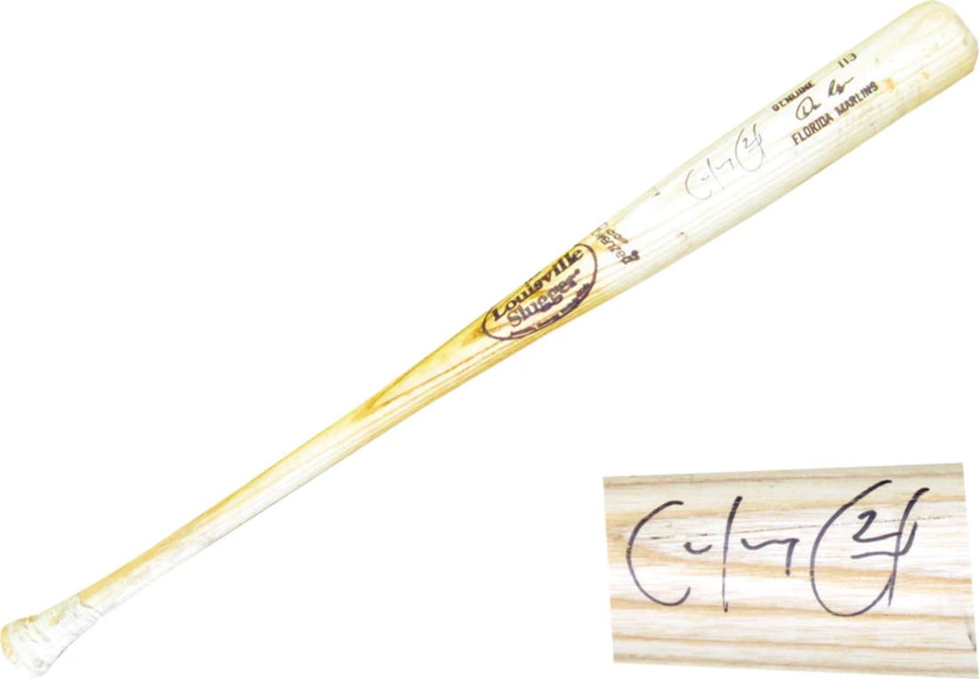 Hanley Ramirez Autographed Dan Uggla Game Used Bat: Hanley Ramirez Autographed Dan Uggla Game Used Bat Hanley Ramirez has signed this Louisville Slugger bat, which was used in a game by Dan Uggla. The bat features the distinctive logo and markings of t