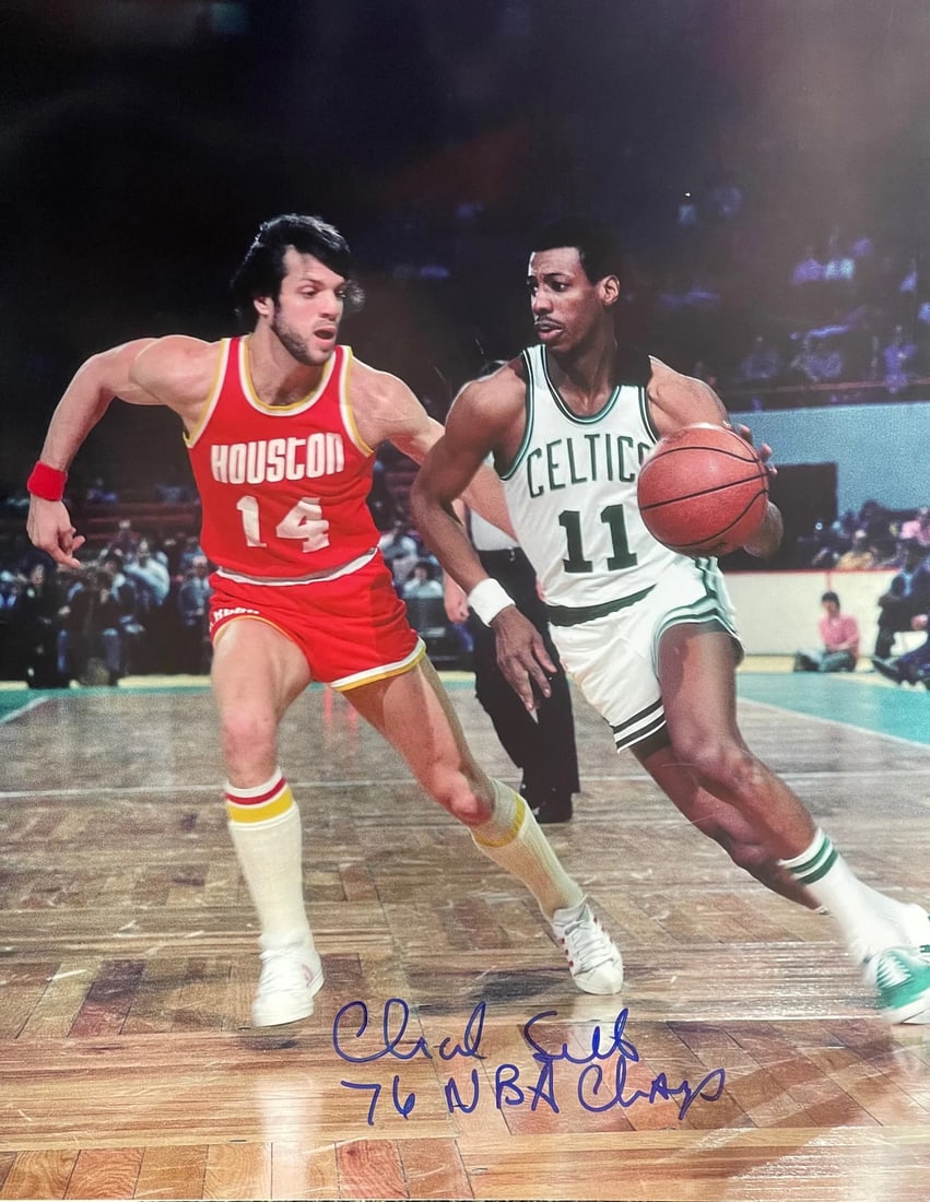 Autographed by Charlie Scott 16x20 Basketball Photo: Autographed by Charlie Scott 16x20 Basketball Photo Charlie Scott's 16x20 basketball photo, signed in blue sharpie across the front with the inscription "76 NBA Champs". This unique piece bears a sign