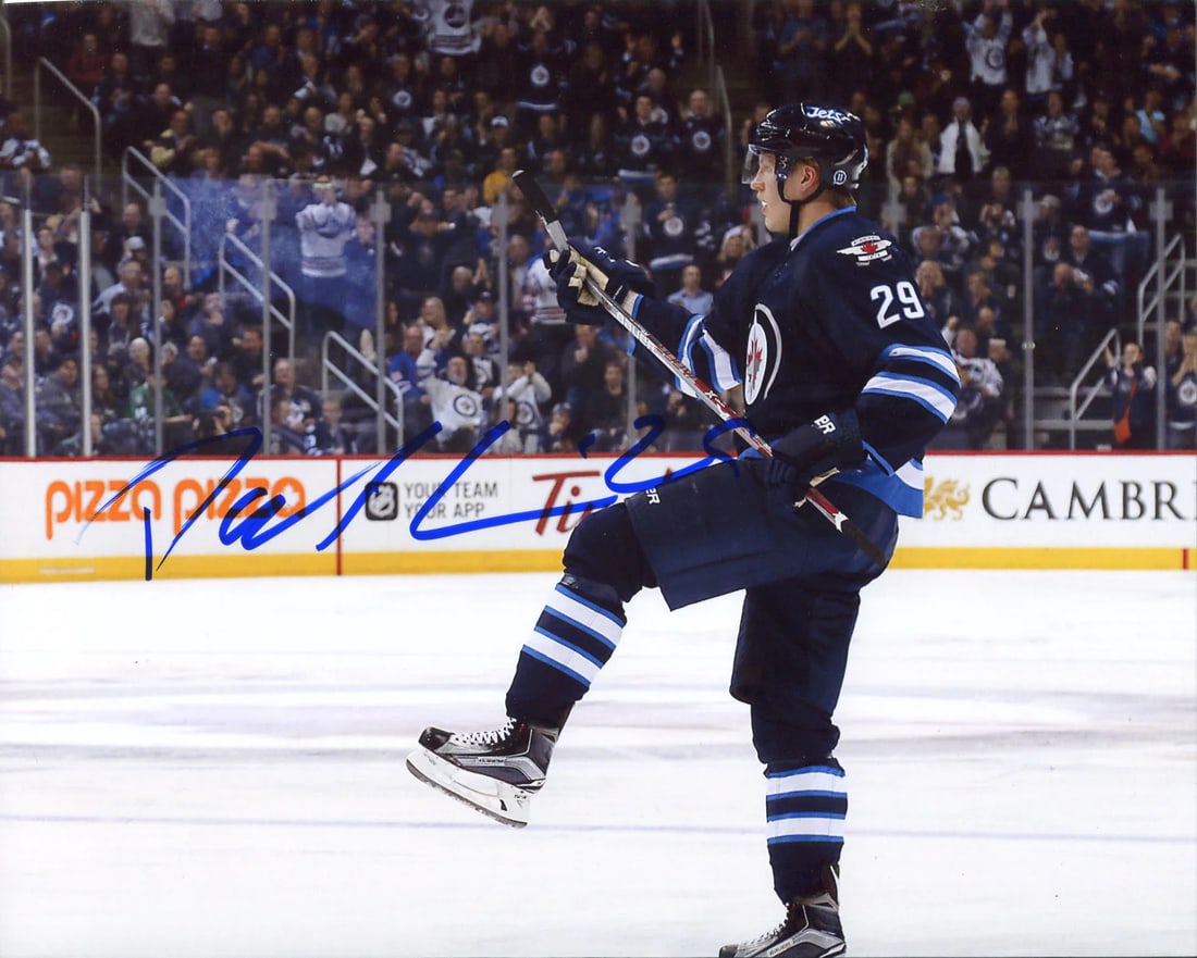 Patrik Laine Autographed 8x10 Photo: Patrik Laine Autographed 8x10 Photo Item Specifics: Signed in blue sharpie across the photo Patrik is celebrating after scoring a goal with the Winnipeg Jets Item is authenticated by Rich Altman's and