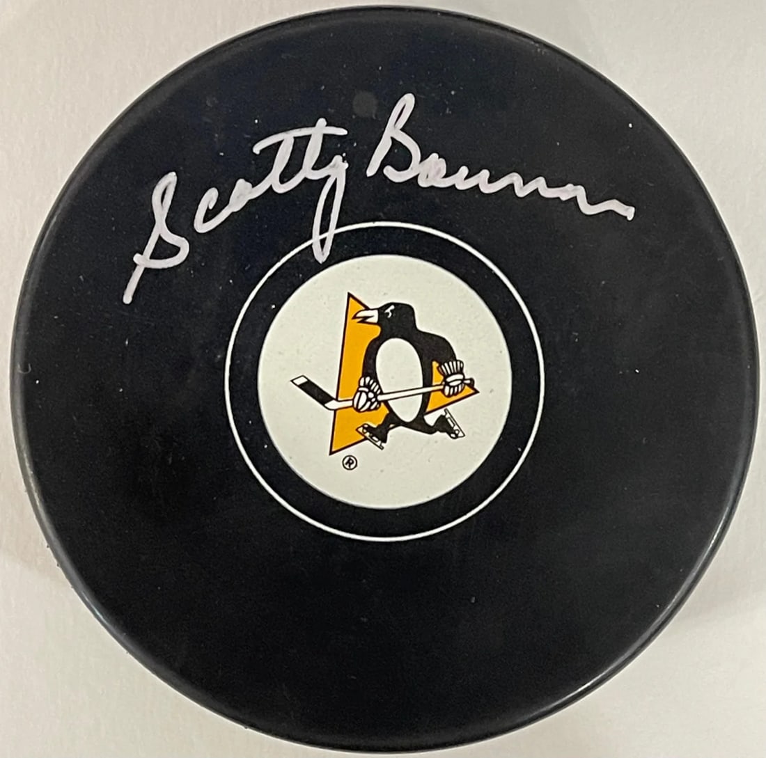 Scotty Bowman Autographed Official Puck: Scotty Bowman Autographed Official Puck Signed in silver sharpie across the top, Scotty Bowman's mark adds a touch of authenticity to this official NHL puck. The puck itself is an official game-used i