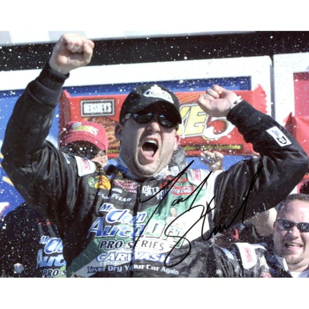 Racing photo autographed by Tony Stewart 8x10: Racing photo autographed by Tony Stewart 8x10 Tony Stewart's bold signature shines across the front of this 8x10 photo, making it a unique and impressive addition to any racing fan's collection. The