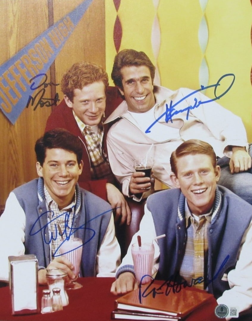 Happy Days Cast Signed (4) 11x14 Photo Howard/ Winkler/ Most/ Williams BAS 201042: Happy Days Cast Signed (4) 11x14 Photo Howard/ Winkler/ Most/ Williams BAS 201042 Four members of the iconic Happy Days cast sign a 11x14 photo, including Howard, Winkler, Most, and Williams. The item