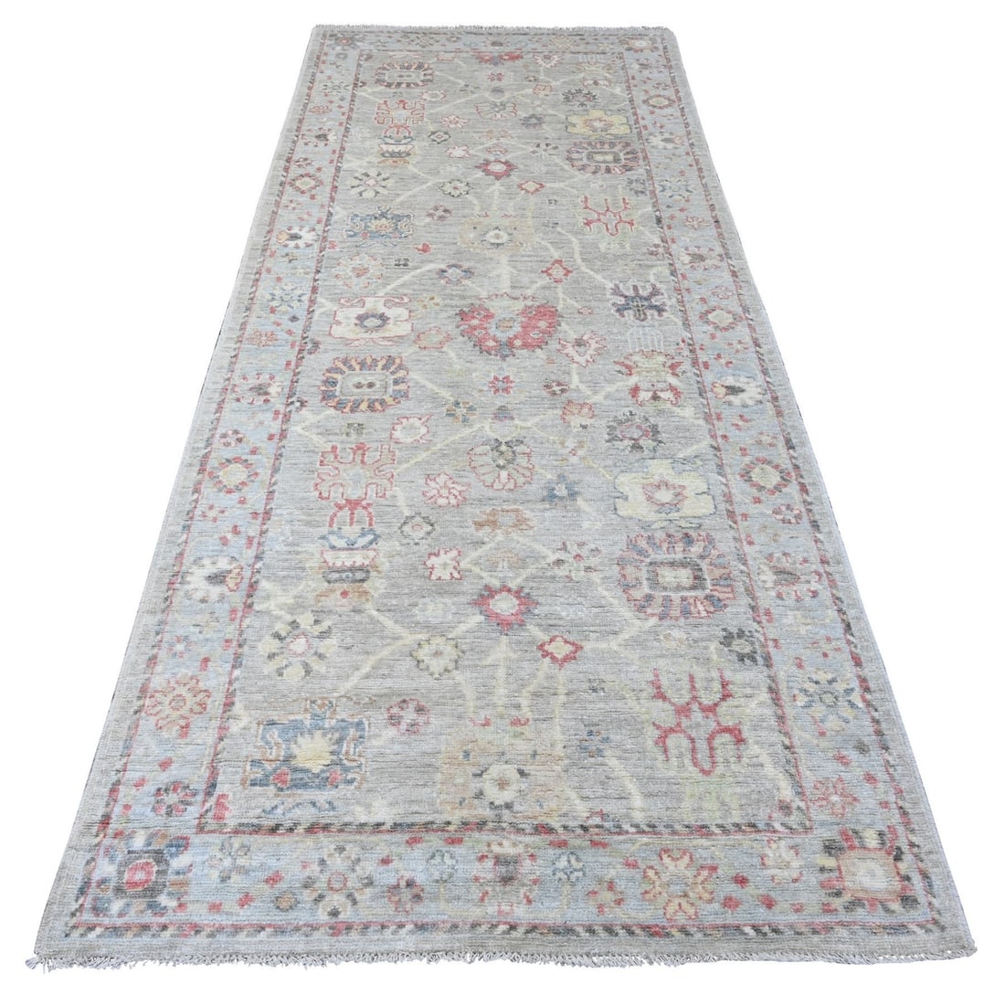 4'2"x9'10" Gray Angora Oushak Vines Design Hand Knotted Wool Runner Rug: 4'2"x9'10" Gray Angora Oushak Vines Design Hand Knotted Wool Runner Rug The Oushak Vines Design Hand Knotted Wool Runner Rug boasts an elegant grey color and intricate vines pattern, showcasing the ex