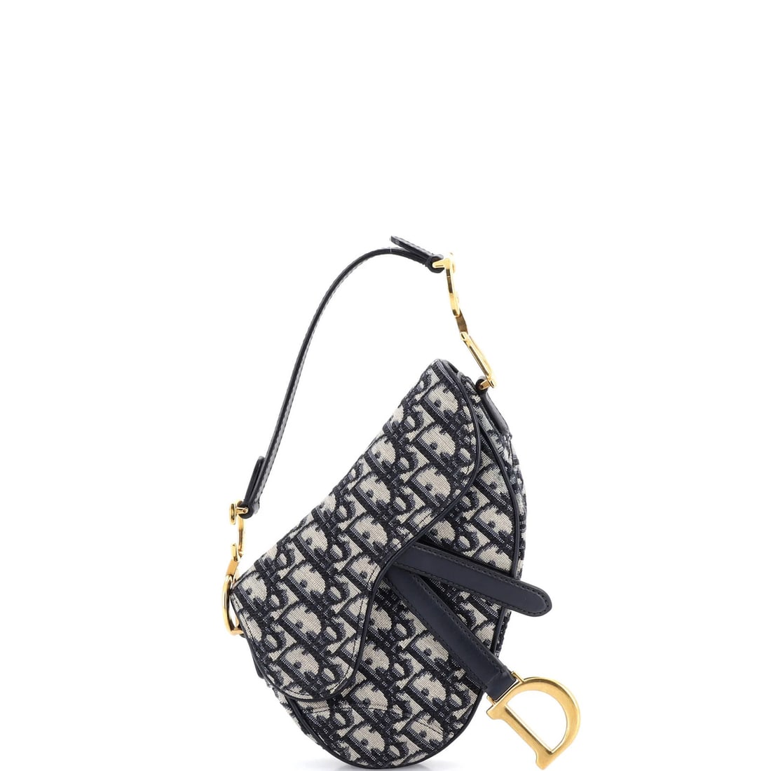Canvas mini handbag saddle Oblique Christian Dior: Canvas mini handbag saddle Oblique Christian Dior Canvas mini handbag saddle Oblique Christian Dior features a striking blue canvas exterior with neutral interior, adorned with aged gold hardware. The