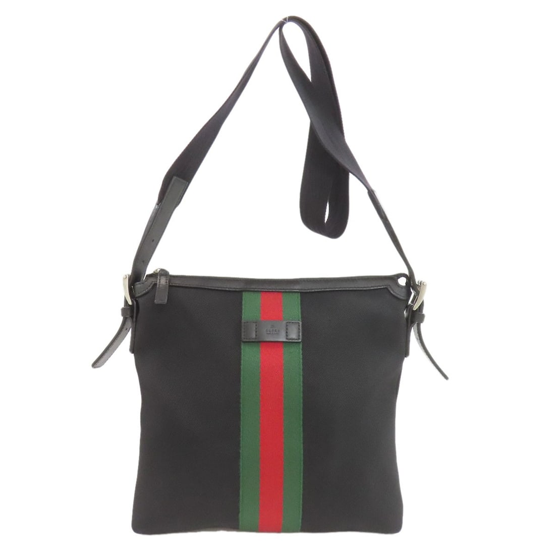 Sherry Line Canvas Shoulder Bag 387111: Sherry Line Canvas Shoulder Bag 387111 Black canvas shoulder bag with a sleek design, featuring the iconic GUCCI style. The bag's exterior bears a signature, adding a touch of elegance to its classic 
