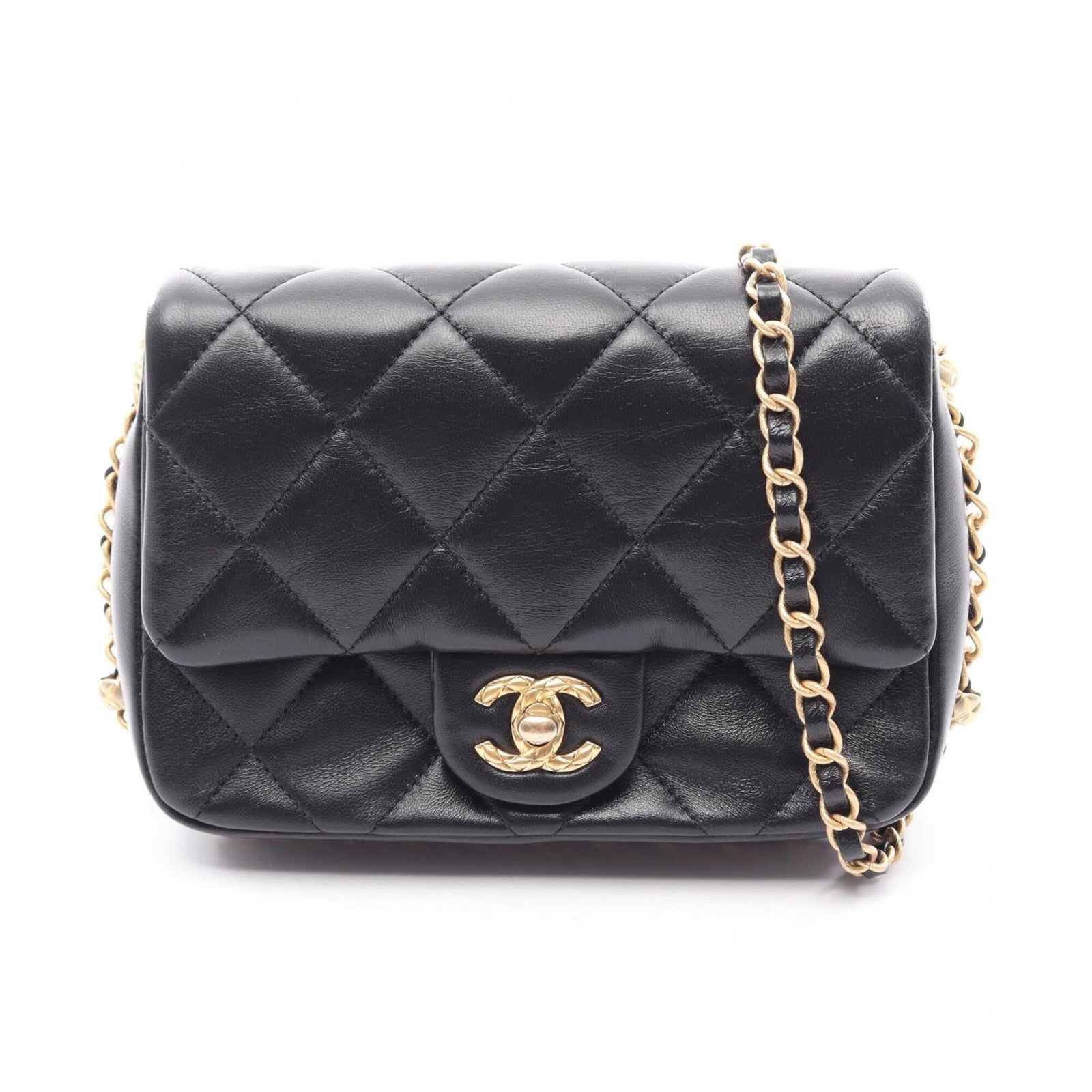 Chanel Handbag Shoulder Bag Leather: Chanel Handbag Shoulder Bag Leather Black leather Chanel shoulder bag with lambskin interior, measuring 14cm x 18cm x 5.5cm. This classic design features a timeless black color that exudes