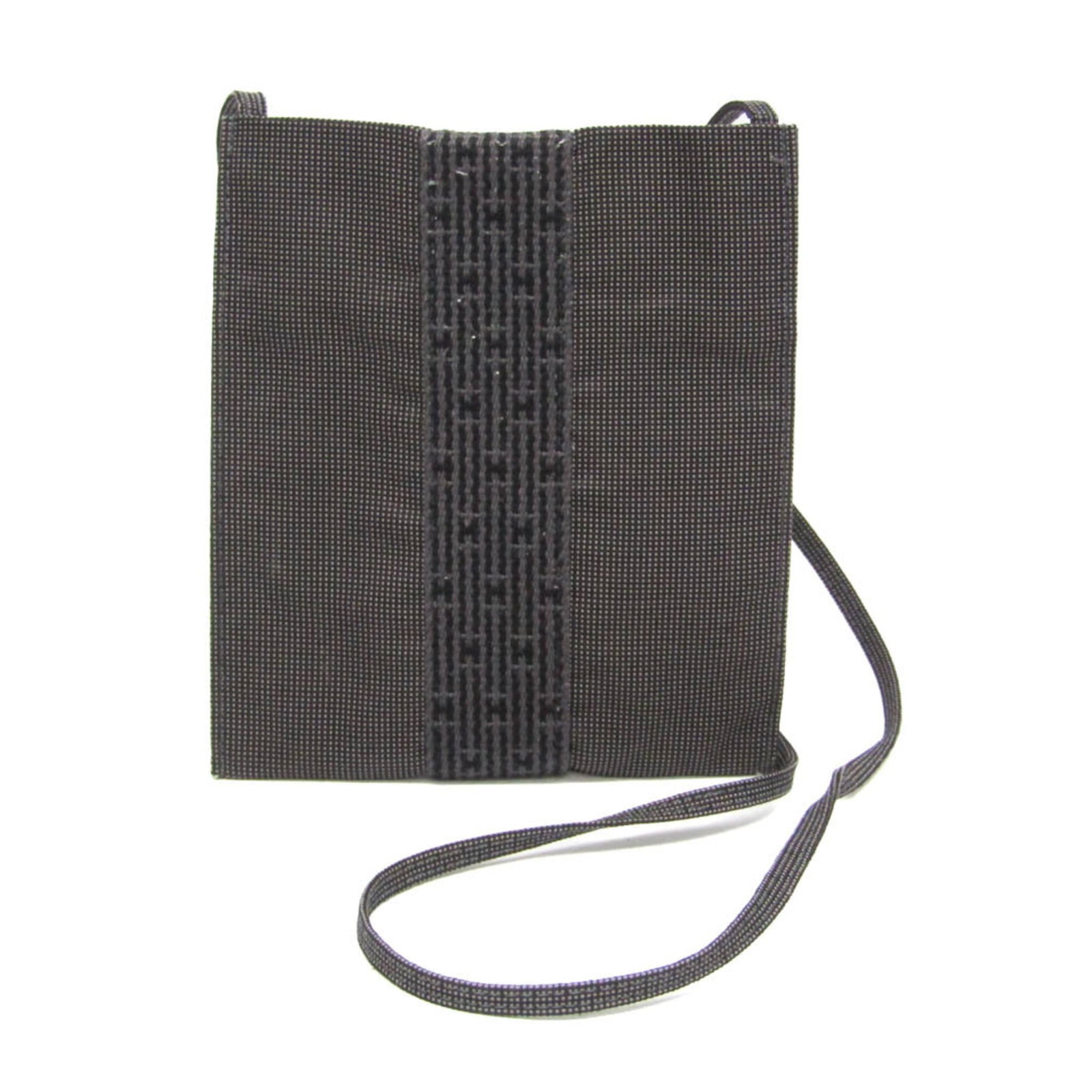 Polyamide bag from Hermes polyester: Polyamide bag from Hermes polyester Polyamide bag from Hermes features a sleek, gray design. Made from a combination of polyamide and polyester materials, it boasts a durable construction. Weighing in