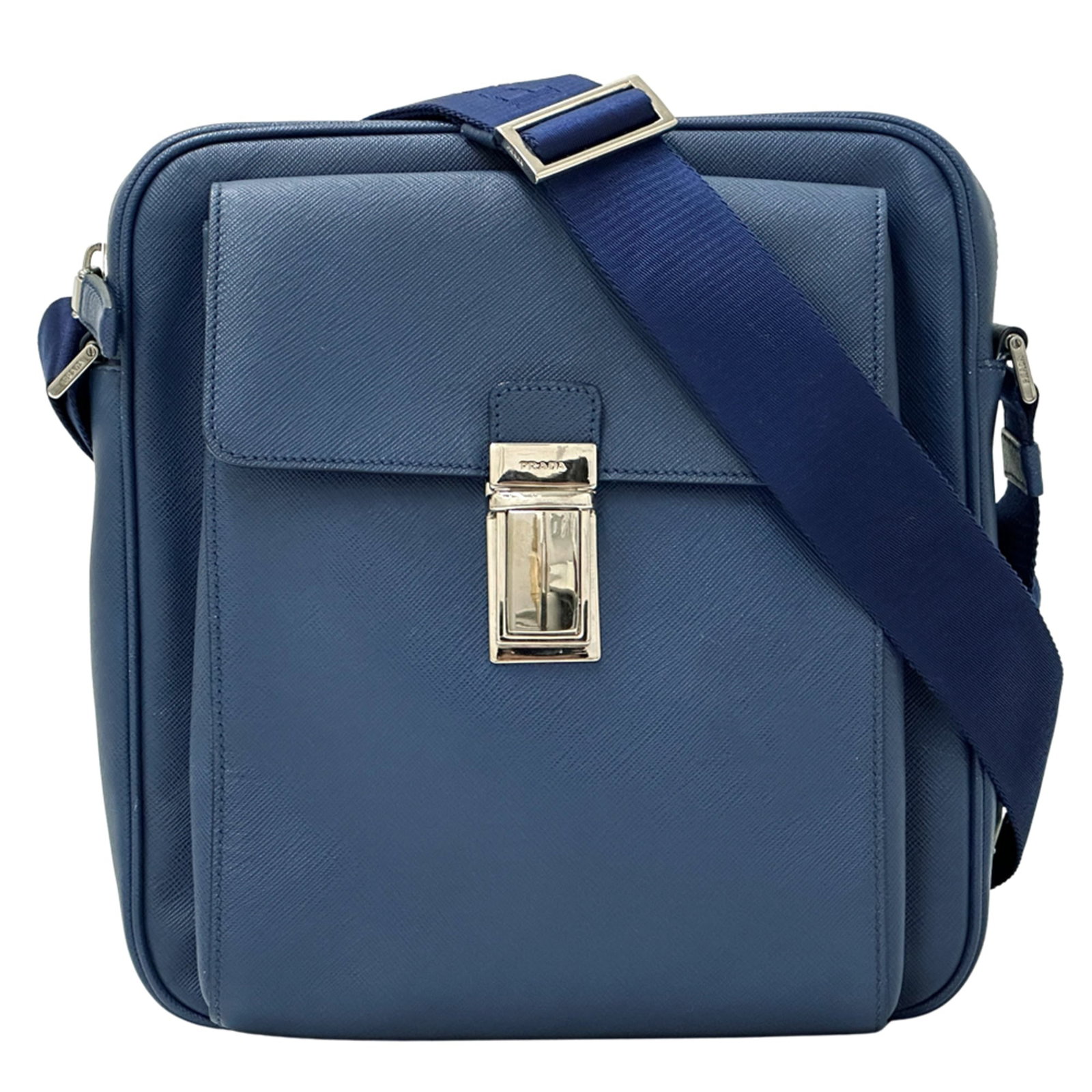 Saffiano shoulder bag handbag by Prada: Saffiano shoulder bag handbag by Prada Saffiano leather handbag from Prada, crafted with durable and water-resistant Saffiano material in a striking blue hue. This shoulder bag measures 26cm x 24cm x 