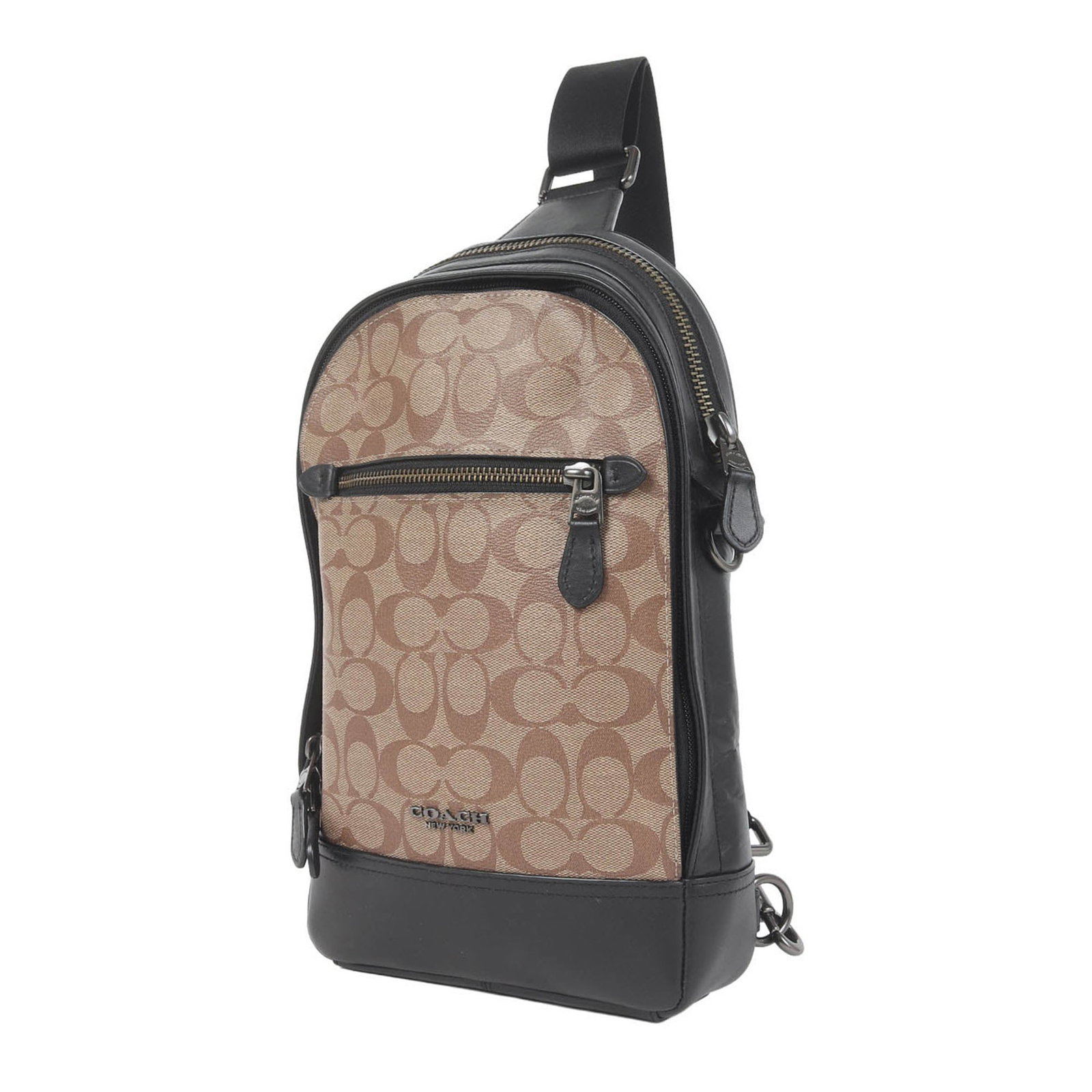 Canvas leather sling bag by coach: Canvas leather sling bag by coach Canvas leather sling bag by Coach, featuring a sturdy canvas and PVC construction with premium leather accents in beige and black hues. The bag's compact size makes i