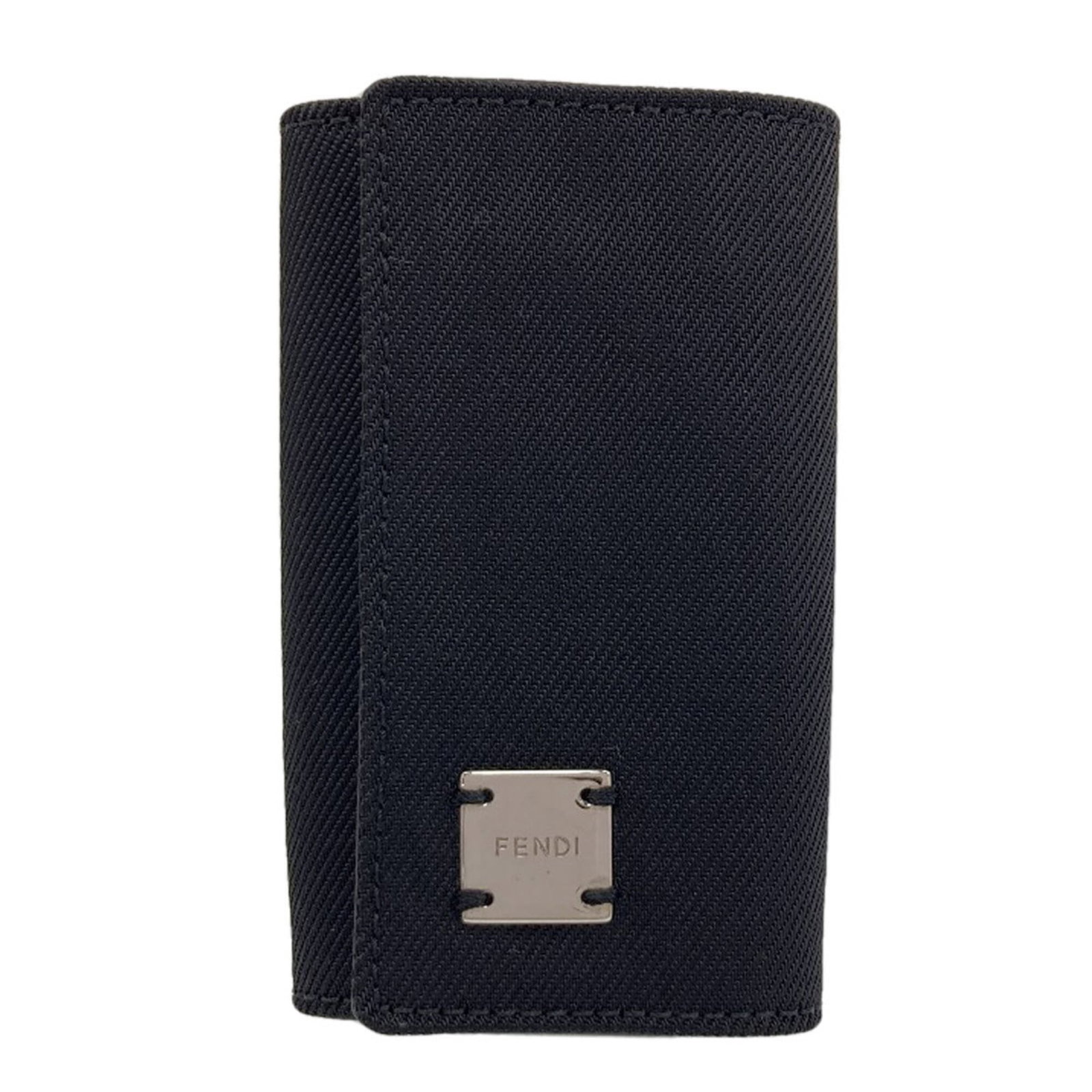 Women's Key Canvas Fendi Logo Case: Women's Key Canvas Fendi Logo Case Canvas Fendi logo case in black, featuring the iconic interlocking FF monogram. Made from high-quality canvas material, this compact case measures 9.5cm x 6cm x 2cm 