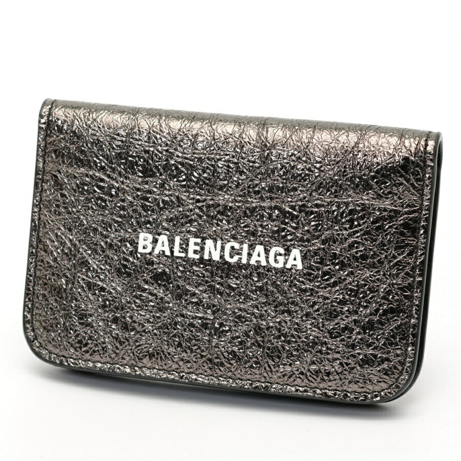 Card case leather by Balenciaga: Card case leather by Balenciaga The Balenciaga leather card case boasts sleek, modern lines and a sophisticated black finish. Made from premium leather, its slim design measures 7cm x 11cm x 2cm, maki