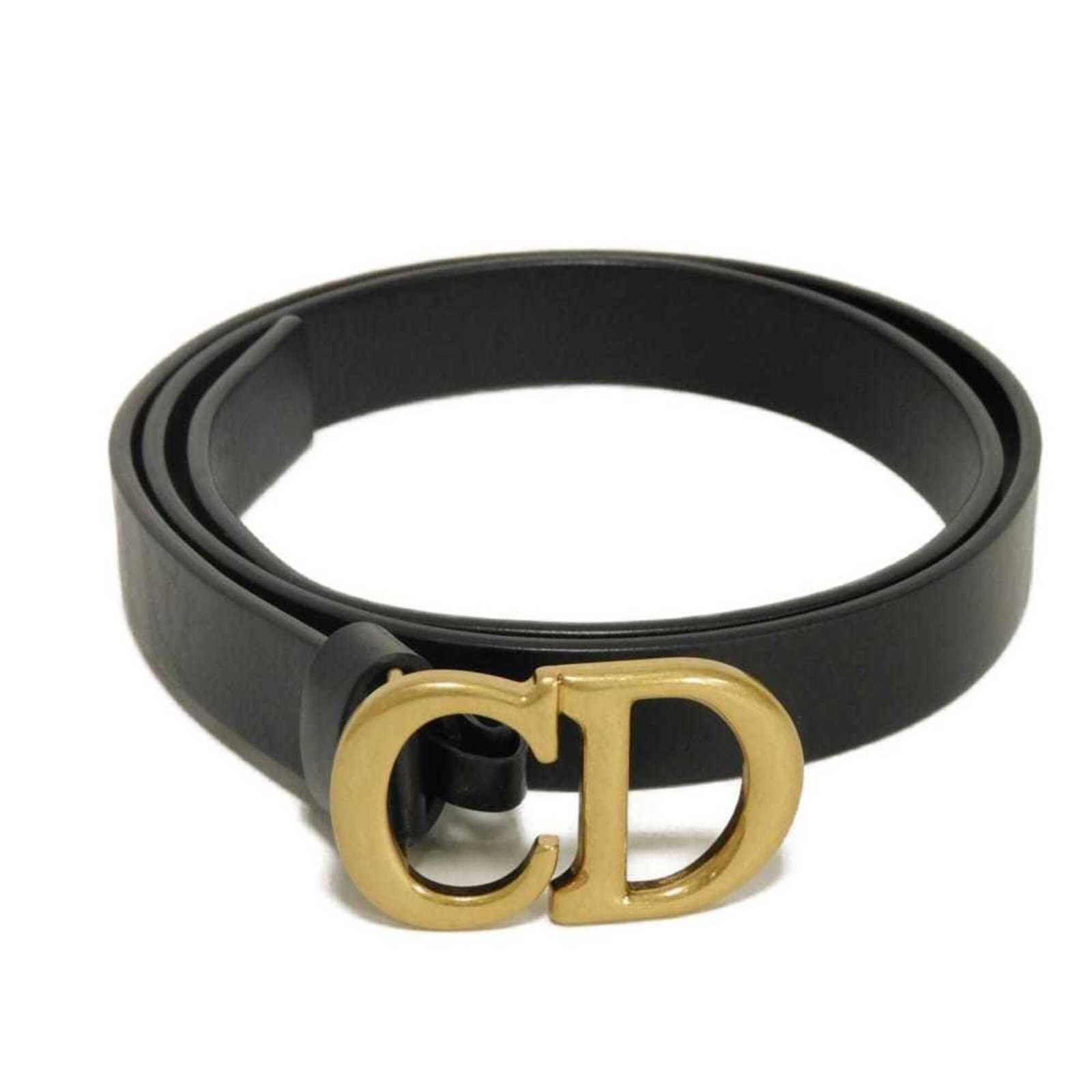Dior Standard Belt by Christian: Dior Standard Belt by Christian Black leather standard belt from Christian Dior, available in lengths of 71cm-81cm. This classic design features high-quality materials and a timeless aesthetic. Item S