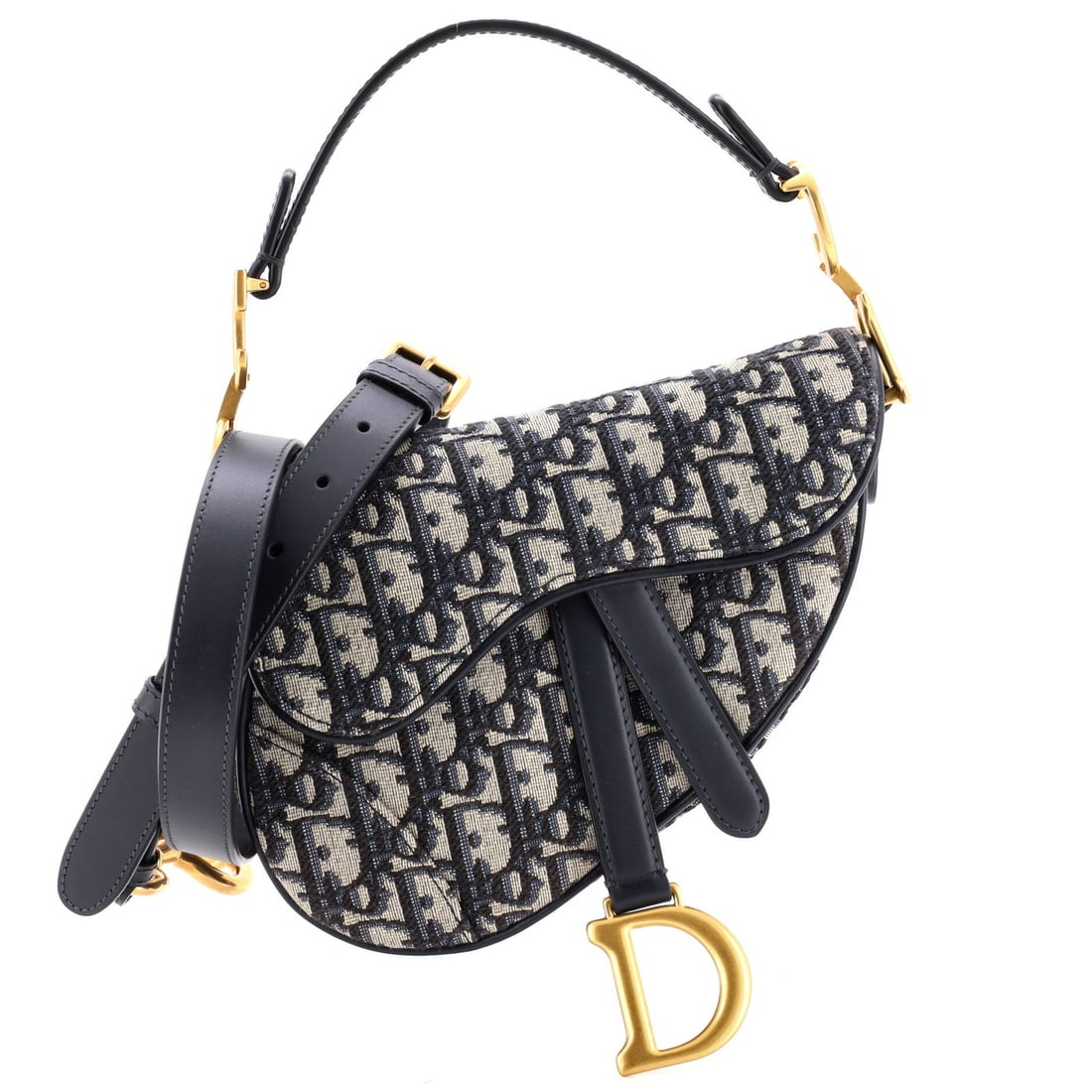 Canvas Oblique Strap Saddle Handbag Dior Christian: Canvas Oblique Strap Saddle Handbag Dior Christian Canvas Oblique Strap Saddle Handbag Dior Christian. This mini shoulder bag features an oblique canvas design with aged gold hardware and a neutral in