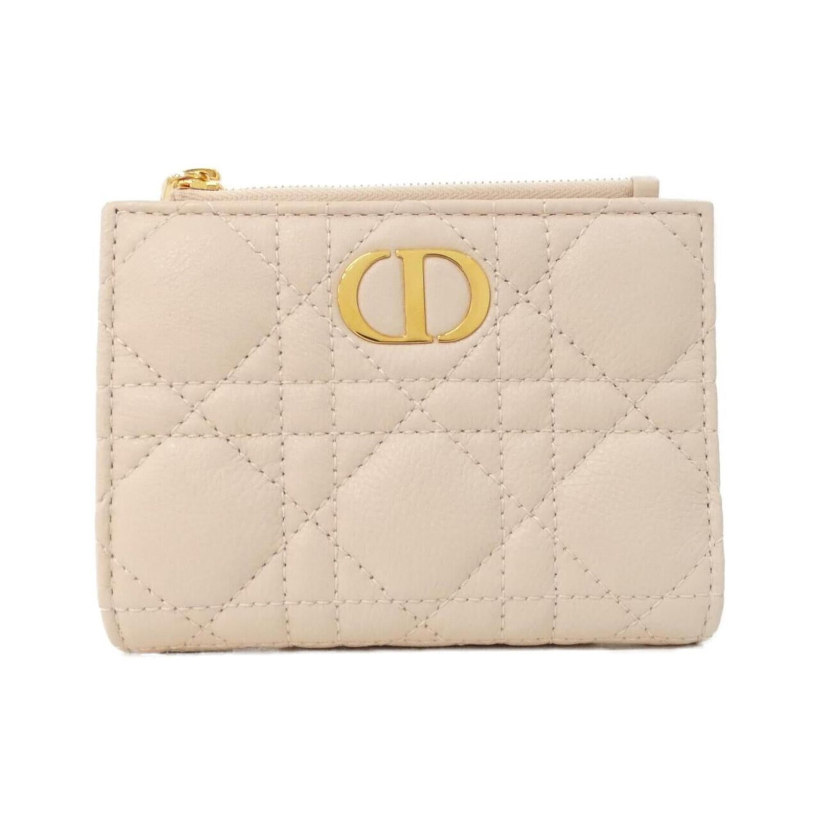 Christian Dior Bi Fold Leather Wallet: Christian Dior Bi Fold Leather Wallet Christian Dior's Bi Fold Leather Wallet boasts sleek, feminine design with a vibrant pink hue. Crafted from high-quality calfskin leather, this stylish wallet fea