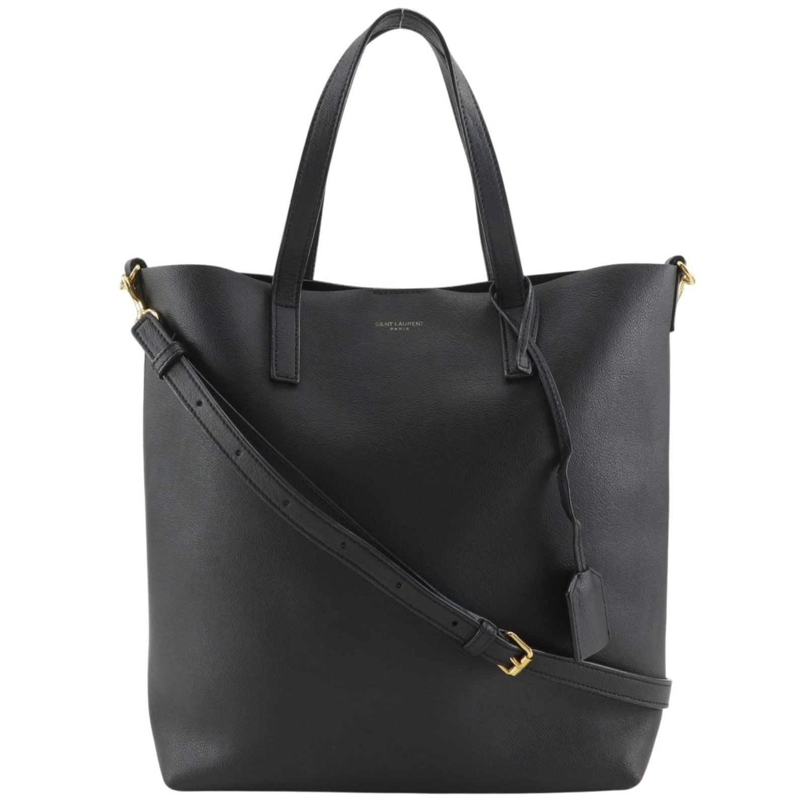 Saint Laurent tote leather bag: Saint Laurent tote leather bag The Saint Laurent tote leather bag boasts sleek, black calfskin material and a timeless design. Measuring 27cm x 24cm x 8cm, it features a sturdy handle drop of 13cm