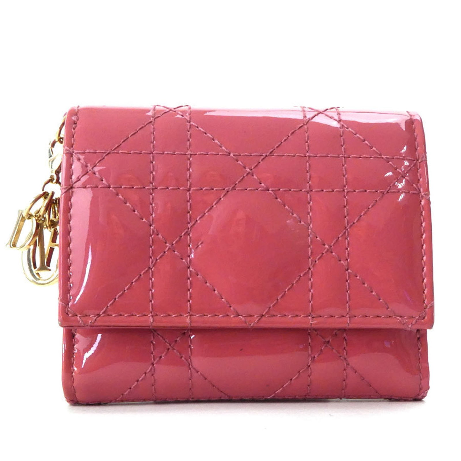Patent Leather Tri Fold Wallet Christian Dior: Patent Leather Tri Fold Wallet Christian Dior Pink patent leather adds a touch of elegance to this Christian Dior tri-fold wallet, featuring a snap fastener closure and multiple inner pockets for orga