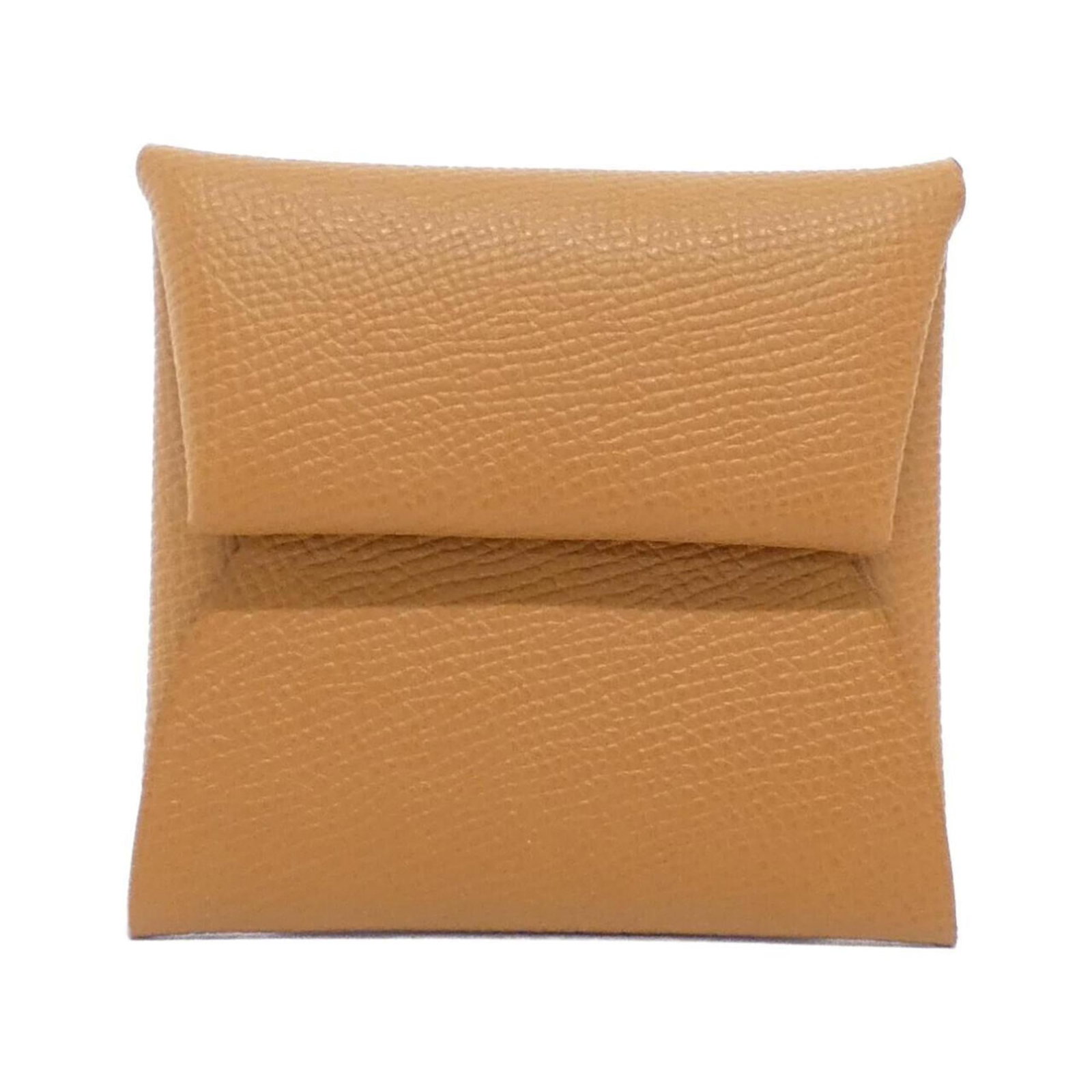 Hermes Coin Purse/ Coin Case Epsom Leather: Hermes Coin Purse/ Coin Case Epsom Leather Epsom leather craftsmanship shines in this elegant coin purse/coin case from the Hermes Bastia line, boasting a sophisticated gold hue that adds a touch of l