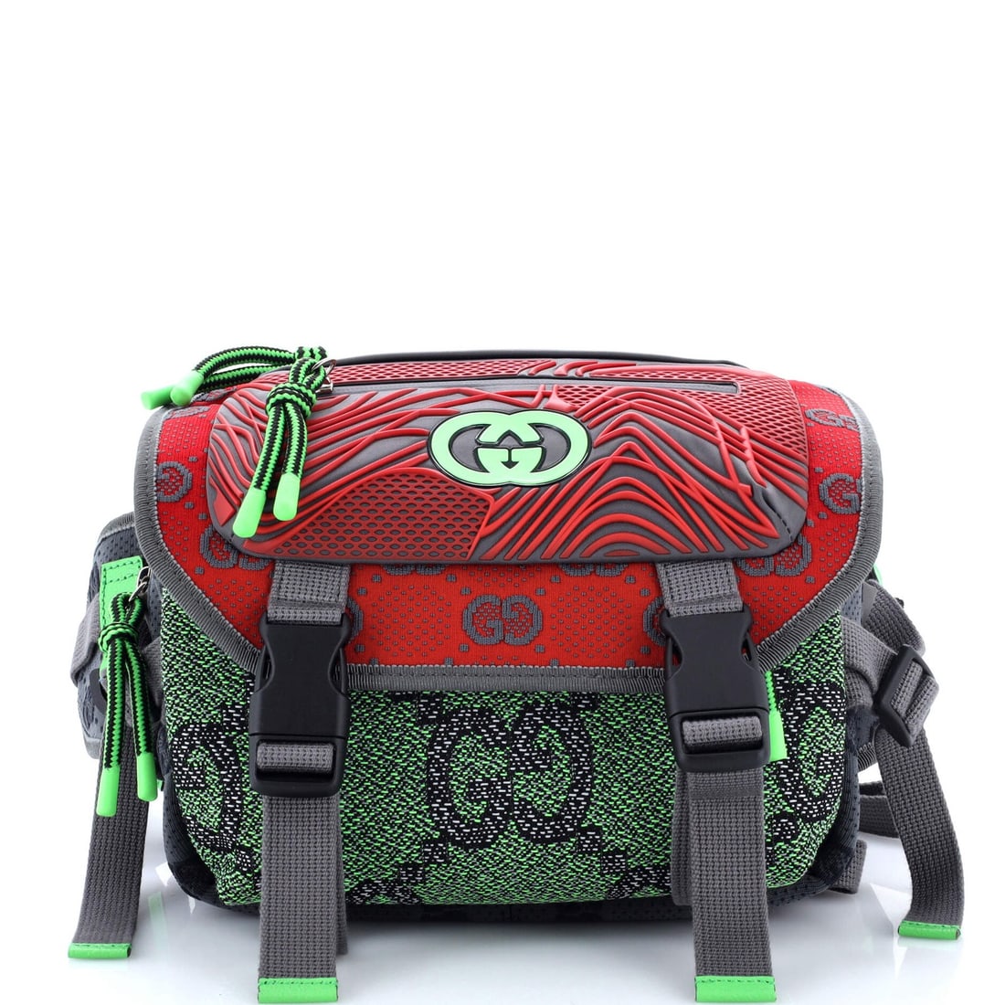 Buckle Flap Chest Strap Backpack with Fabric and Rubber: Buckle Flap Chest Strap Backpack with Fabric and Rubber Red Buckle Flap Chest Strap Backpack with Fabric and Rubber Exterior. This Gucci backpack features a bold red exterior with fabric and rubber ma
