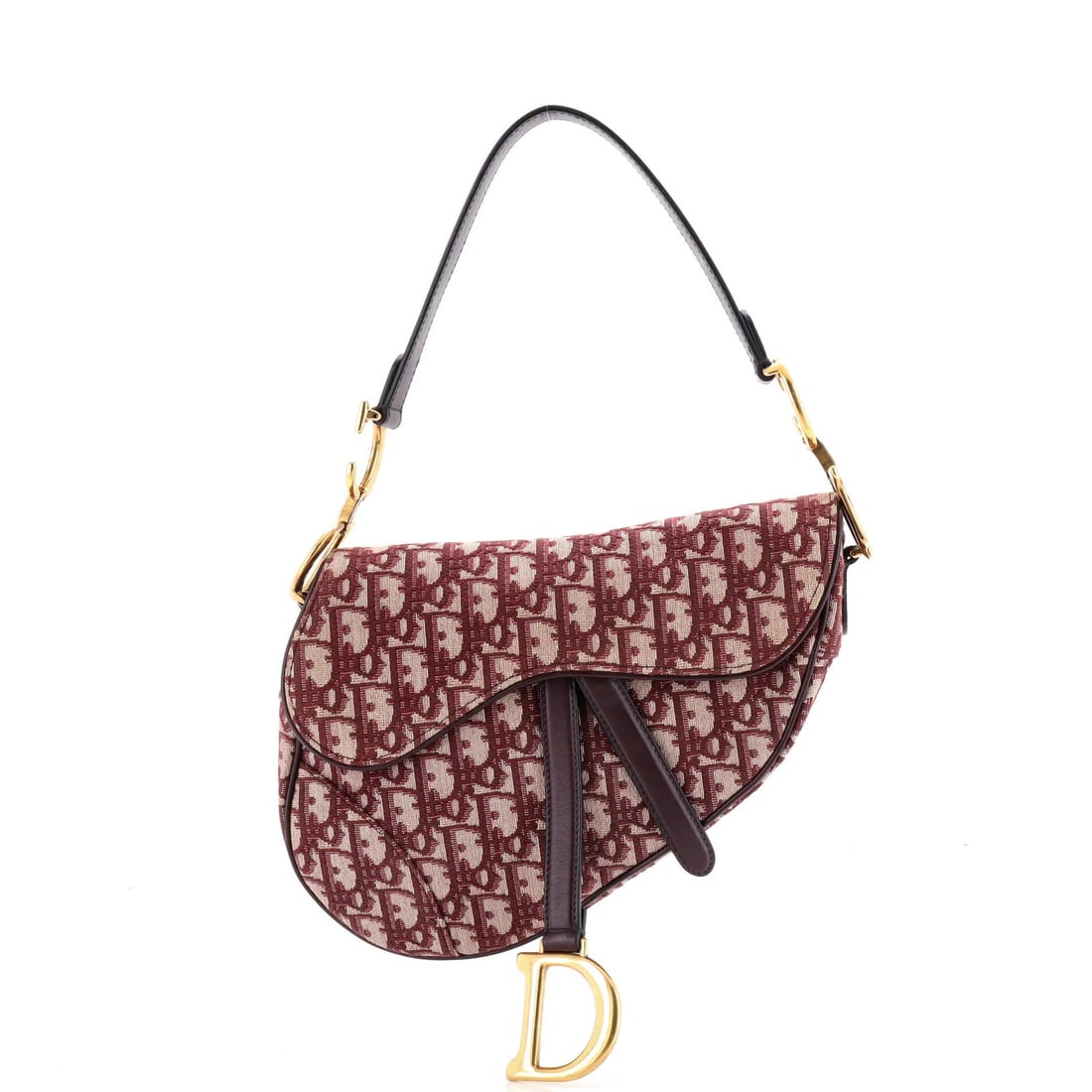 Canvas handbag saddle oblique medium Christian Dior: Canvas handbag saddle oblique medium Christian Dior Canvas handbag saddle oblique medium Christian Dior, featuring a striking red canvas exterior with subtle creases and minor scuffs. The aged gold ha