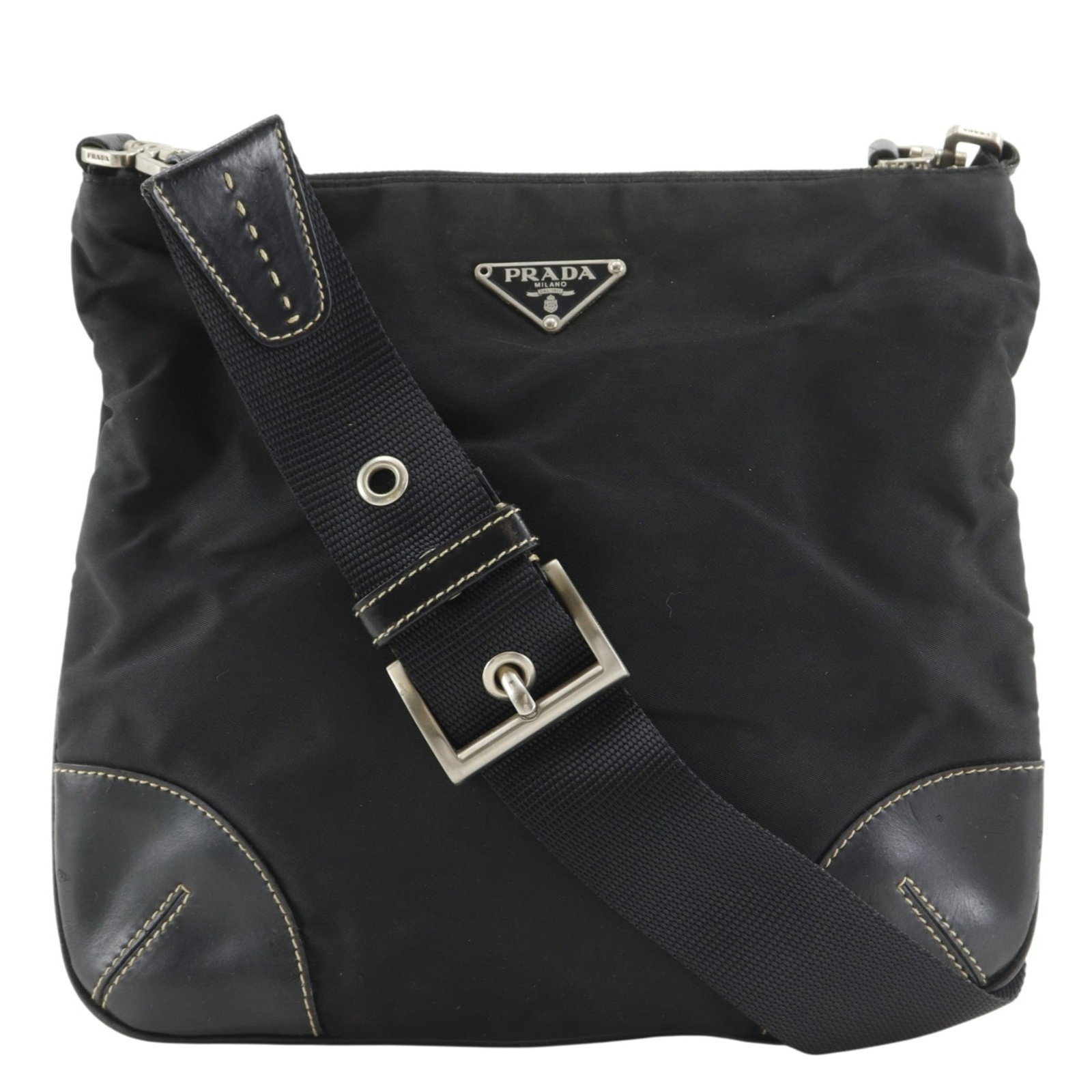 Prada Shoulder Bag Nylon: Prada Shoulder Bag Nylon Prada Nylon Shoulder Bag - Sleek and Compact Design. This black Prada shoulder bag features a durable nylon material, adjustable strap with a drop of 53cm, and a compact size 