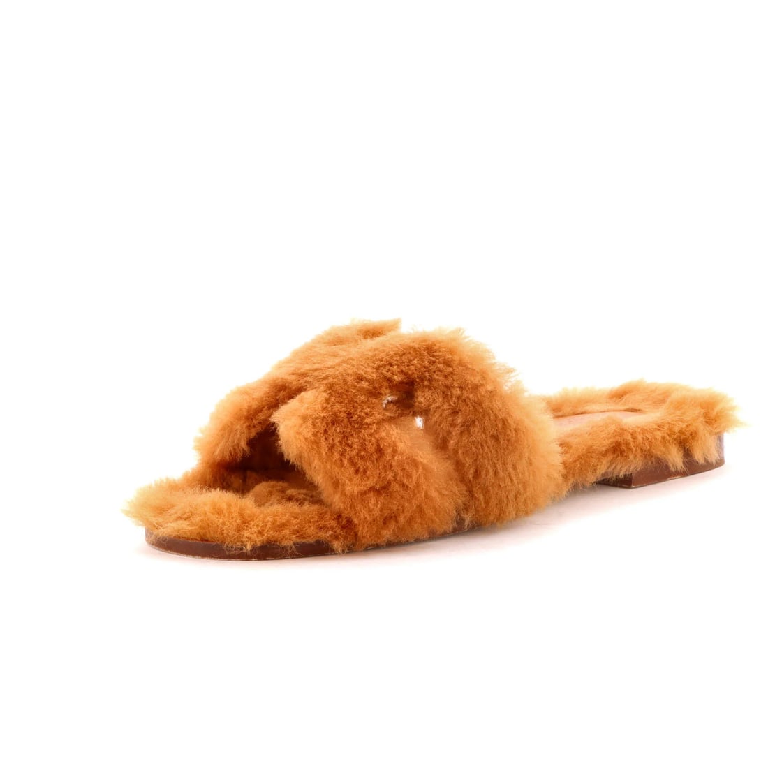 Hermes Women's Oran Sandals Shearling: Hermes Women's Oran Sandals Shearling Shearling upper adds an exotic touch to the classic design of these Hermes Women's Oran Sandals. The brown exterior features subtle scuffs and indentations on the
