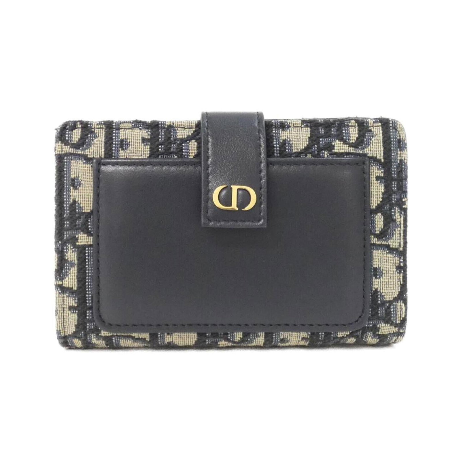 Canvas Leather Bi Fold Wallet Christian Dior: Canvas Leather Bi Fold Wallet Christian Dior Canvas Leather Bi Fold Wallet Christian Dior features a unique blend of canvas and calfskin leather, with a striking blue color. This bi-fold wallet measur