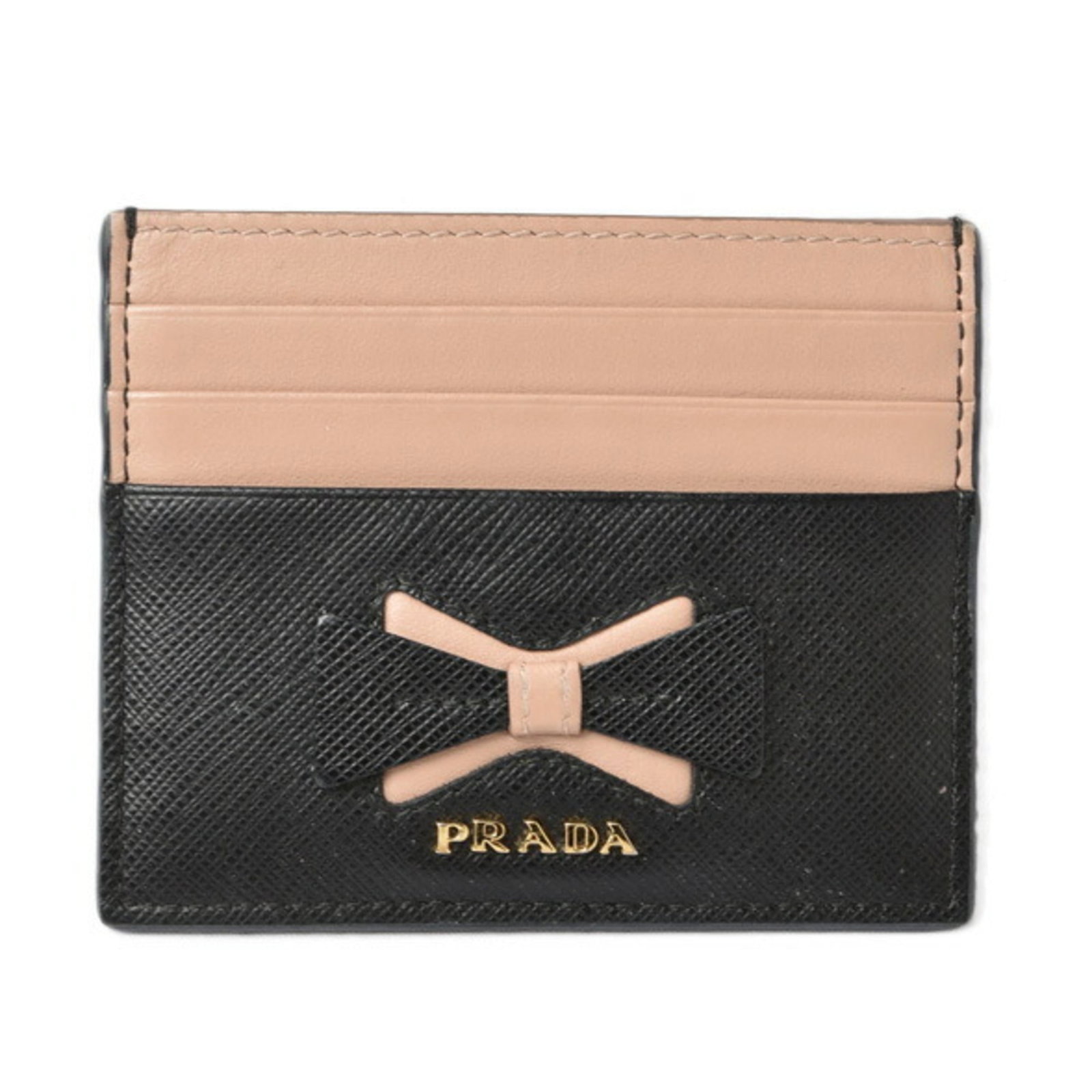 Card Case Saffiano by Prada: Card Case Saffiano by Prada Saffiano leather card case by Prada, crafted with attention to detail and presented in sleek black. Measuring 8cm x 10cm, it provides a compact space for cards and accessor