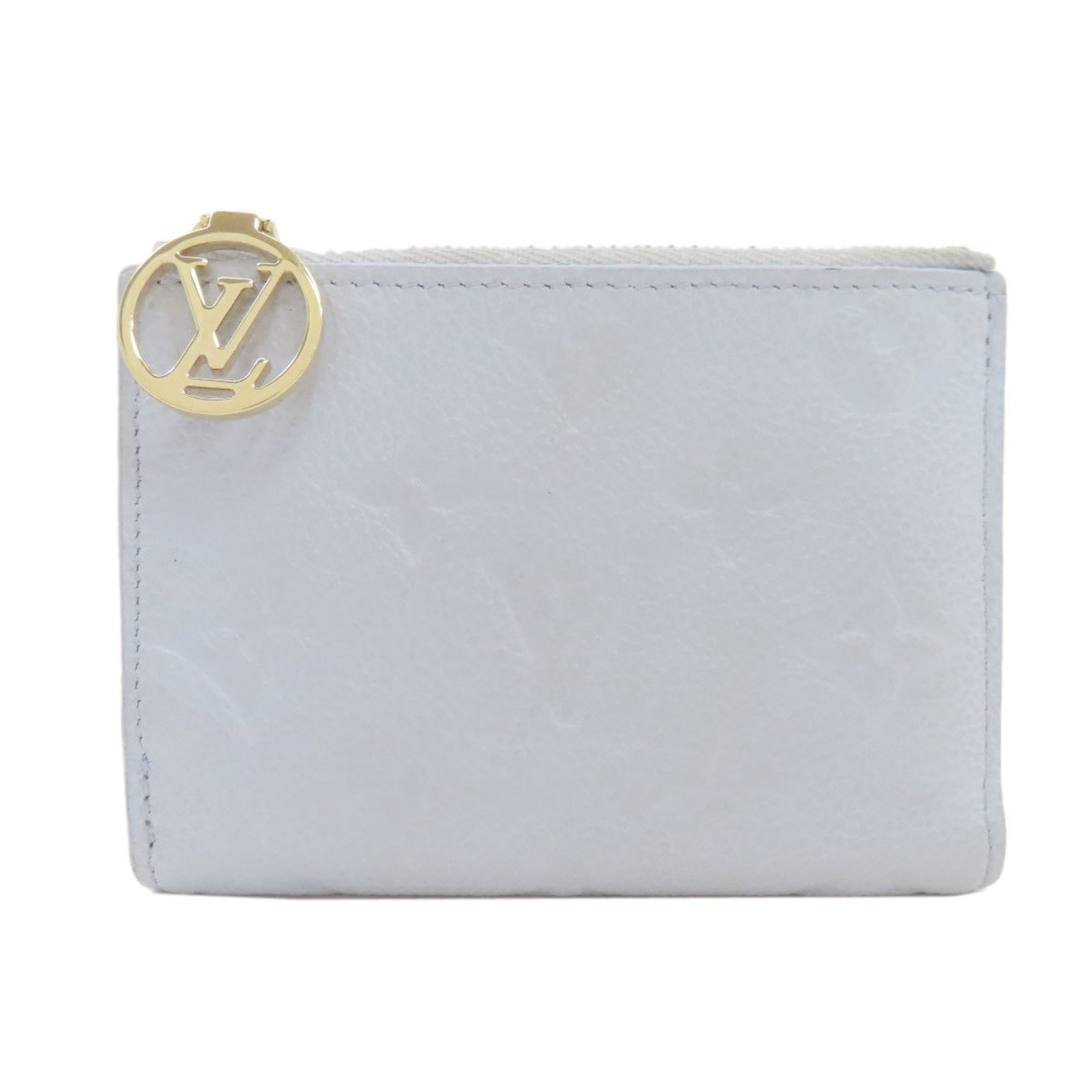 Monogram Empreinte Bi Fold Louis Vuitton: Monogram Empreinte Bi Fold Louis Vuitton Monogram Empreinte Bi Fold Louis Vuitton. This blue bi-fold wallet features the iconic Monogram Empreinte pattern, a signature design element of the Louis Vuit