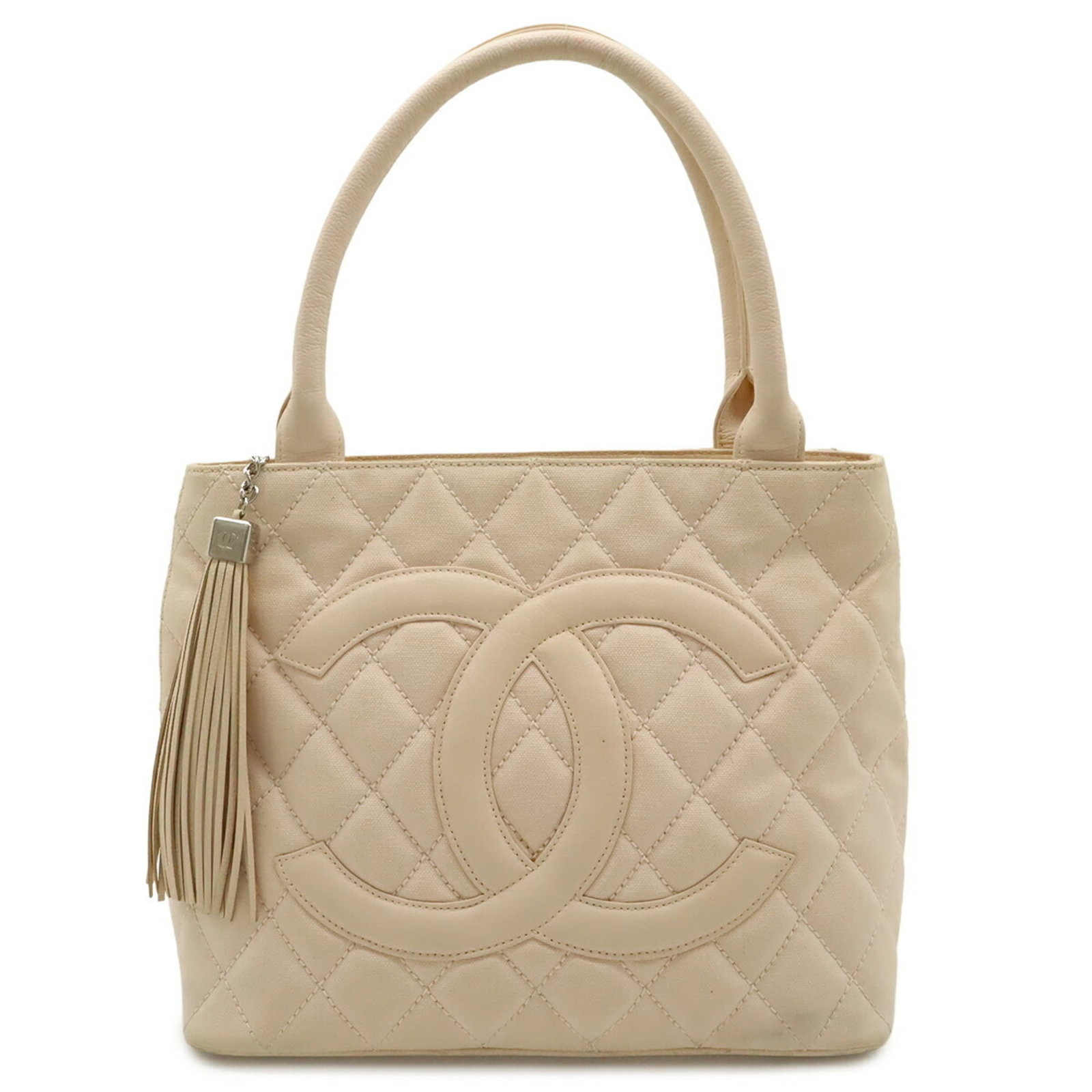 Canvas leather tote bag shoulder bag by Chanel: Canvas leather tote bag shoulder bag by Chanel Canvas leather tote bag by Chanel, featuring a striking pink color and classic Matelasse design. This shoulder bag measures 24.5cm x 30cm x 15cm and weig