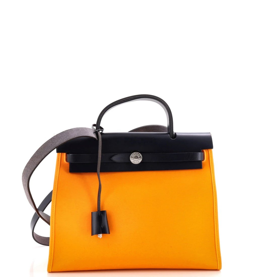 Hermes Herbag Zip Leather and Toile 31: Hermes Herbag Zip Leather and Toile 31 Yellow Herm?s Herbag Zip Leather and Toile 31 shoulder bag with minor creases on the exterior, featuring a palladium lock and keys. The interior is made of canva