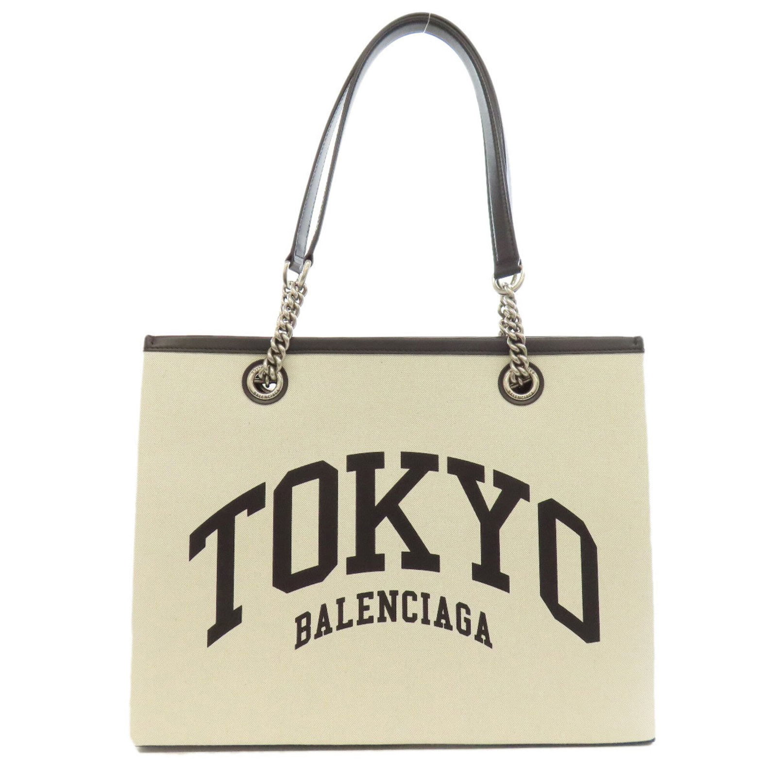 Canvas bag tote by Balenciaga: Canvas bag tote by Balenciaga Canvas bag tote by Balenciaga. This black and white canvas tote measures 27cm x 35cm x 14cm, with a sturdy handle length of 55cm. A stylish and functional accessory for e