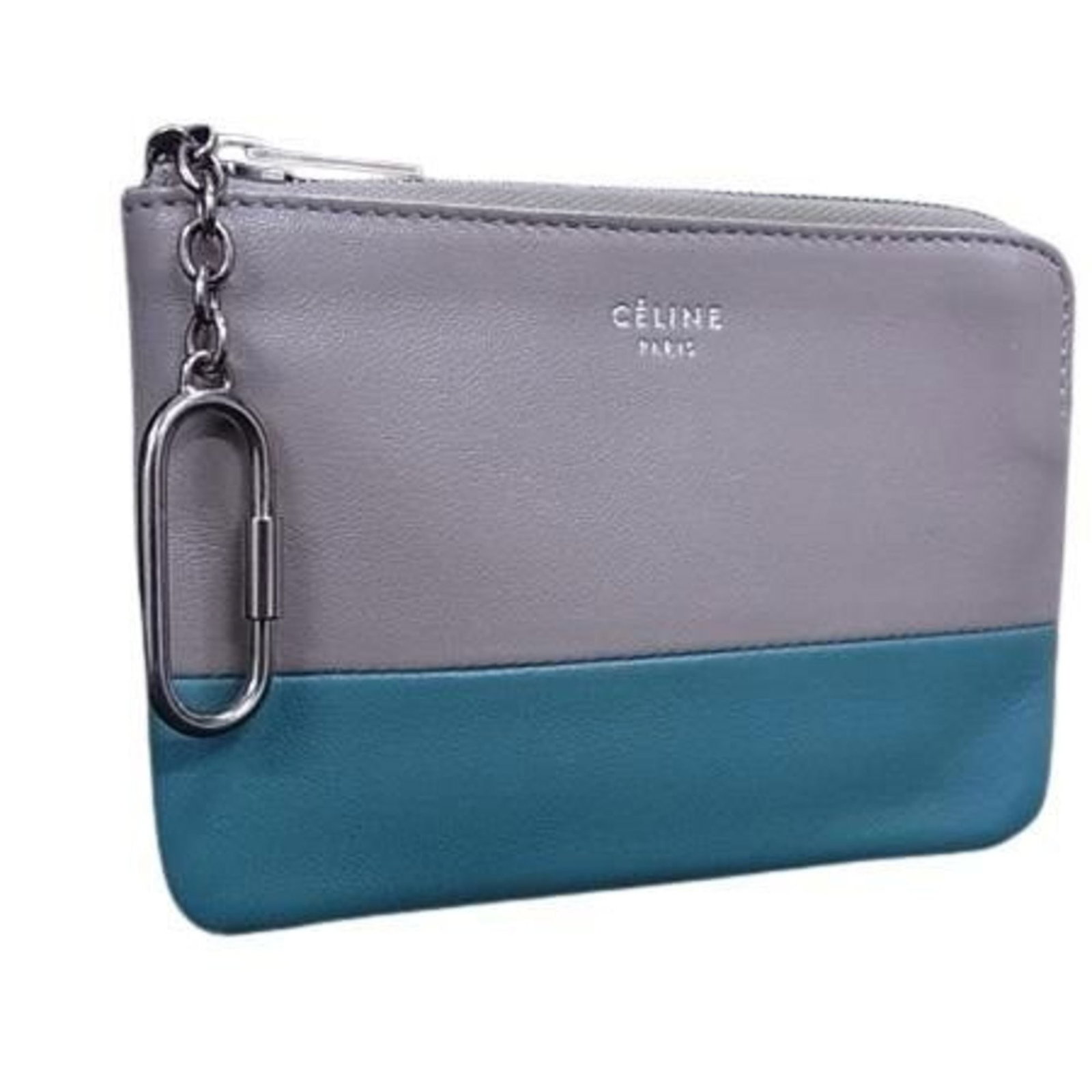 Coin purse coin case leather: Coin purse coin case leather The Celine Country of Origin: Italy leather coin purse/coin case boasts a sleek design with a blue and gray color scheme. Made from high-quality leather, its compact size 