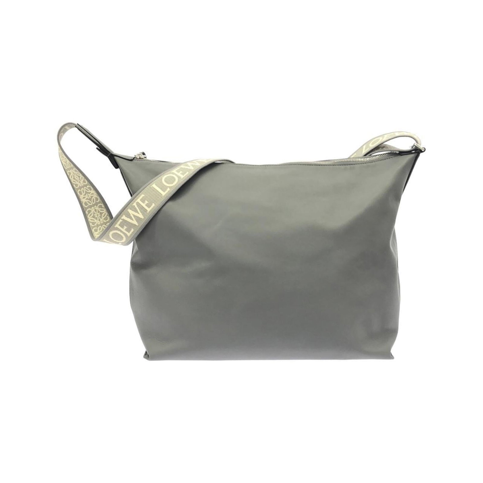 Shoulder Bag Leather: Shoulder Bag Leather Made from high-quality calfskin leather, this shoulder bag boasts a sleek gray color and compact size. The bag's dimensions make it perfect for carrying essentials on-the-go, with