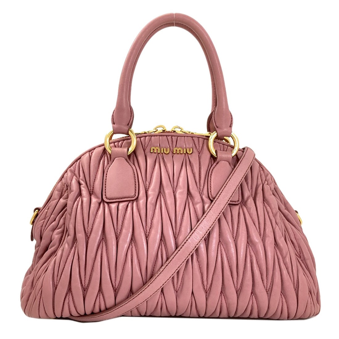 Materasse Calf 2Way Handbag: Materasse Calf 2Way Handbag Pink calf exterior, a vibrant and eye-catching hue, sets the tone for this stylish MIUMIU handbag. The 2Way design adds a touch of sophistication, while the pink color