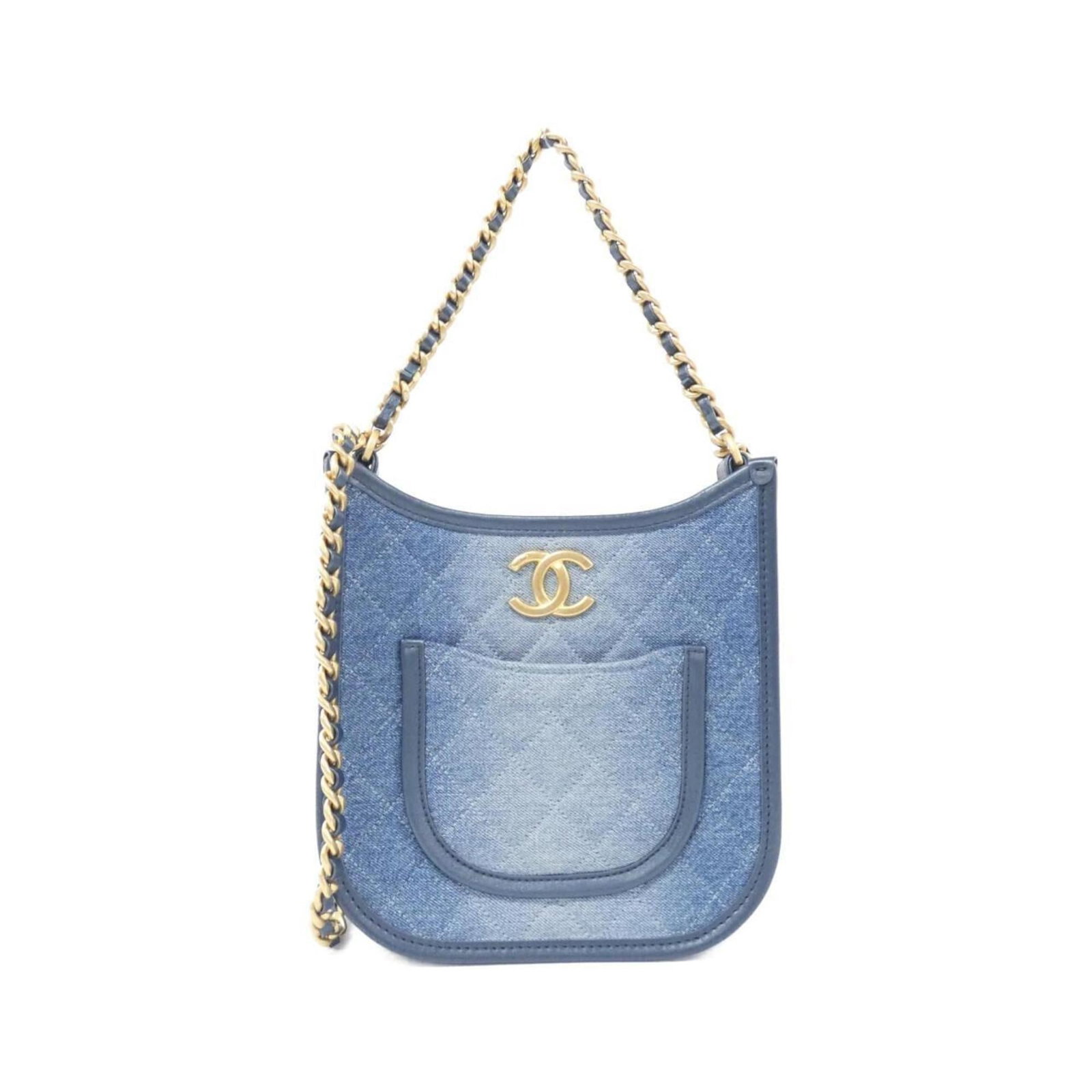Chanel denim bag: Chanel denim bag Chanel denim bag in blue, featuring a zipper pocket and open pockets for added convenience. The bag's durable denim material and sturdy design make it a practical choice for daily use