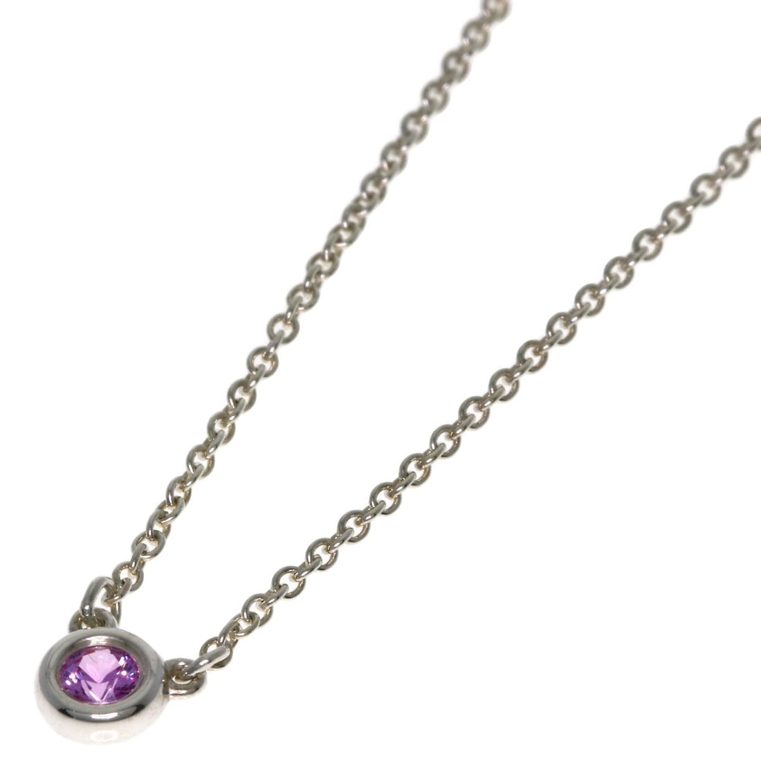 Pink Sapphire Necklace by Tiffany&Co. Silver: Pink Sapphire Necklace by Tiffany&Co. Silver Silver Tiffany&Co. necklace with a sleek, modern design features the brand's signature style. This 16.3-inch long necklace showcases the brand's attention 