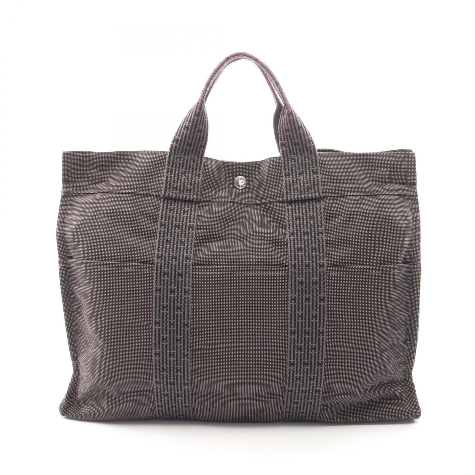 Hermes Handbag Tote Bag Nylon Canvas: Hermes Handbag Tote Bag Nylon Canvas Nylon canvas construction provides durability and versatility to this versatile tote bag, while its gray color offers a neutral and timeless aesthetic. Measuring 3
