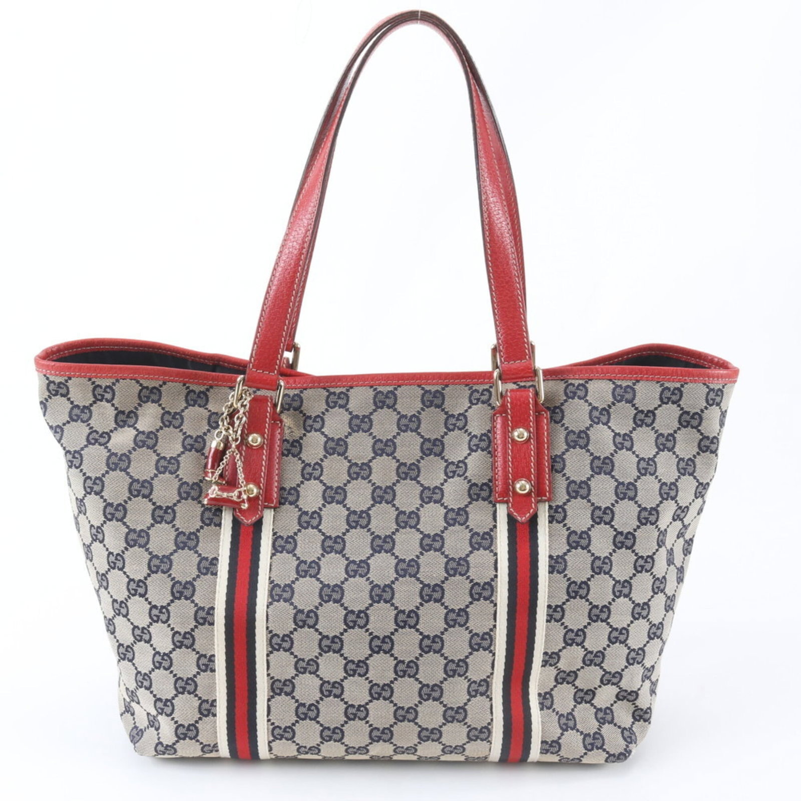 Shoulder Bag Leather Canvas Gucci Handbag: Shoulder Bag Leather Canvas Gucci Handbag Leather and canvas come together in this Gucci shoulder bag, available in three colors: beige, navy, and red. With dimensions of 26cm x 31cm x 17cm, it offers