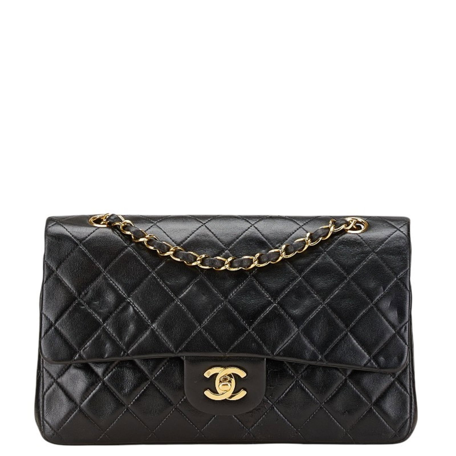 Shoulder Bag Leather Chanel: Shoulder Bag Leather Chanel Black lambskin shoulder bag from Chanel, measuring 15.5cm x 25cm x 6.5cm, comes with a guarantee card. This leather bag features the iconic design and style of Chanel, made